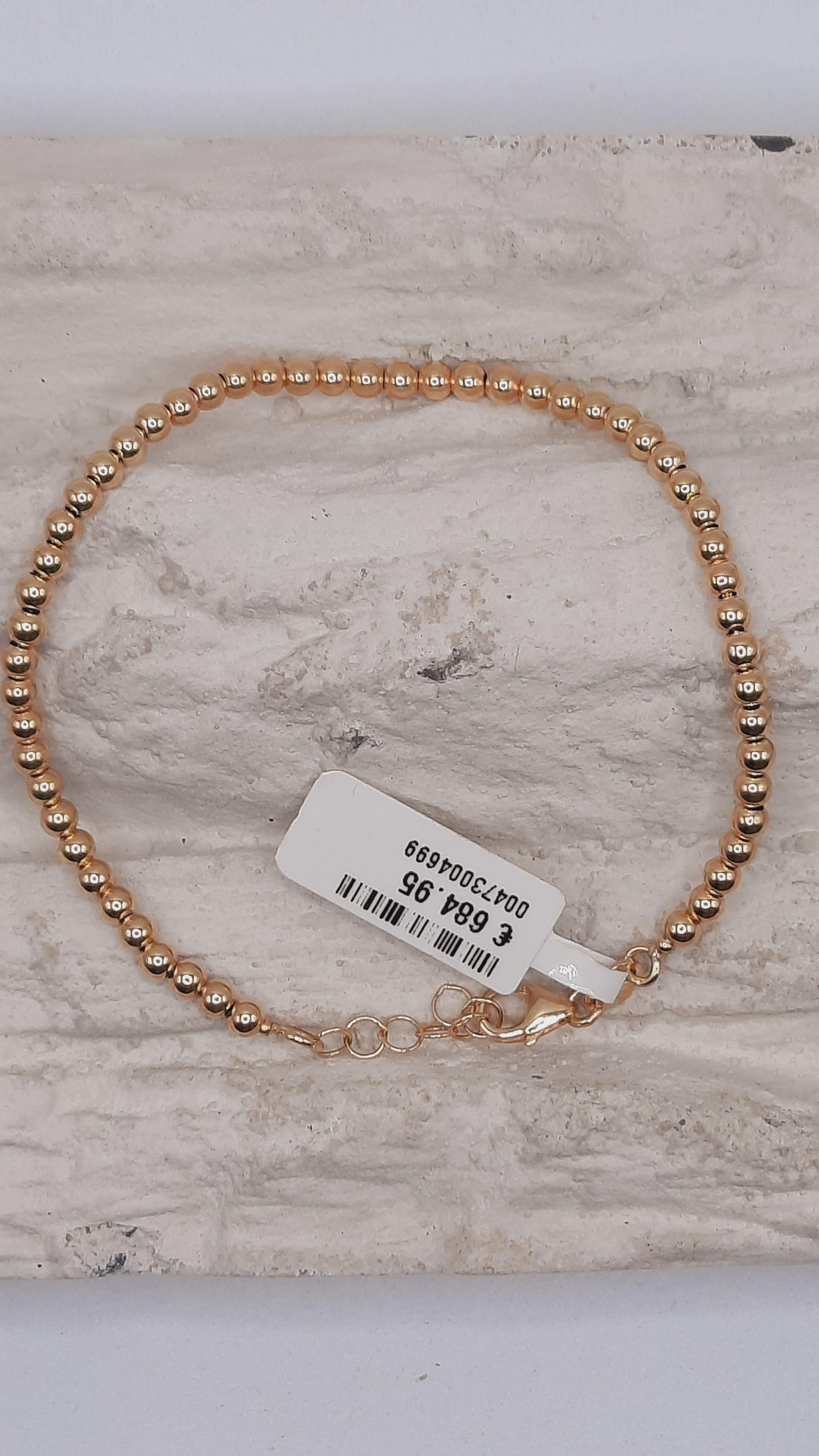 De armband, modelnummer 0002308, is een verfijnd sieraad van 14-karaats goud, met een elegante goudkleurige finish. De breedte van 3,1 mm en een lengte van 190 mm maken het geschikt voor dagelijks gebruik of speciale gelegenheden. Combineer het met andere gouden sieraden voor een elegante en samenhangende look. Perfect voor zowel casual als formele outfits.