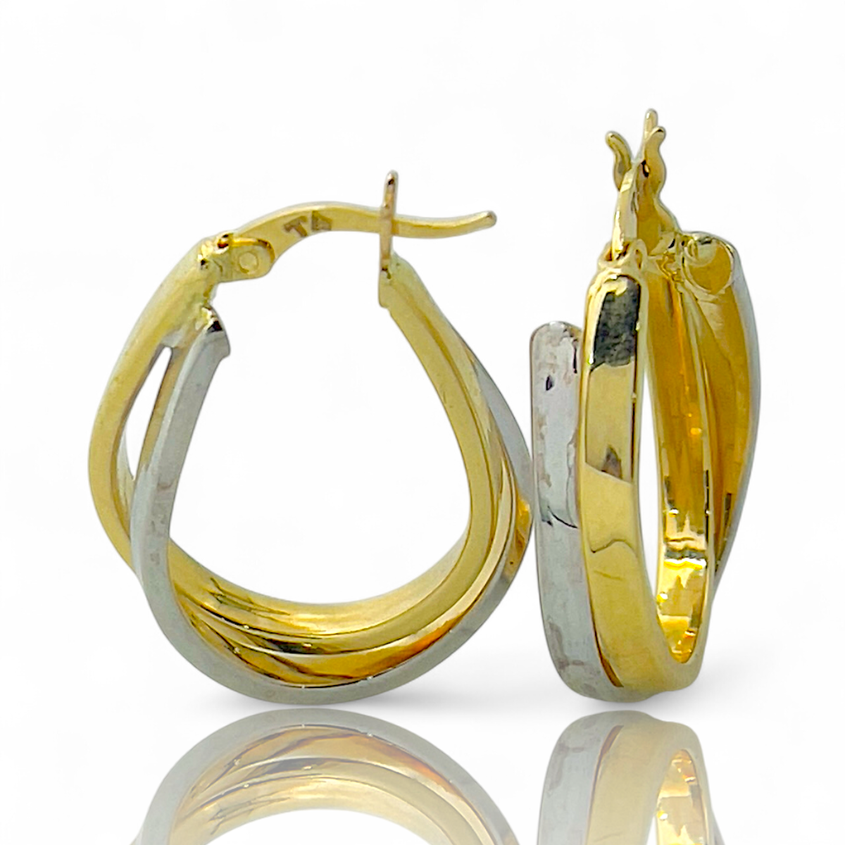 Deze prachtige bi-color oorringen van 14k goud, modelnummer BI-COLOR OORRINGEN, zijn ideaal voor elke gelegenheid. Met hun unieke ontwerp zijn deze creolen een stijlvolle toevoeging aan je sieradencollectie. Perfect om te dragen bij zowel casual als formele outfits. Tip: Combineer ze met andere gouden sieraden voor een elegante uitstraling. Categorie: Juweel. Gewicht onbekend.