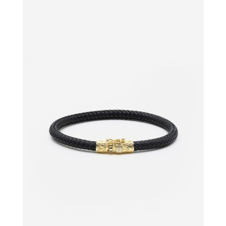 De 149BL GV E - Leather Bracelet Ellen Gold Vermeil Black, modelnummer 001J05149E905, is een elegante armband van 925 sterling zilver met een goudkleurige vergulding. Met een lengte van 190 mm en luxe uitstraling is deze armband perfect voor zowel formele als informele gelegenheden. Draag hem solo voor een minimalistische look of combineer met andere sieraden voor extra flair.