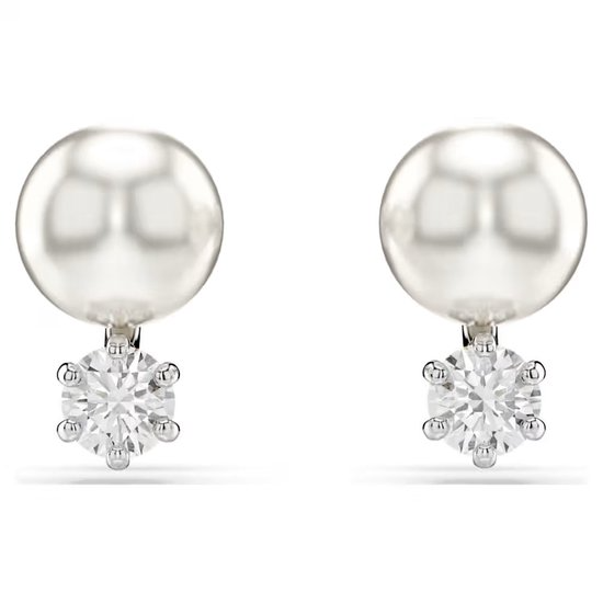 Swarovski Matrix oorsieraden 5701604 Deze prachtige oorknoppen bieden een frisse kijk op de klassieke pareloorbel. De sieraden met rhodium toplaag zijn voorzien van een witte Swarovski Crystal Pearl en een Swarovski Zirkonia in Round-slijpvorm, gekoppeld in een verfijnd en luxe ontwerp. Combineer ze met een bijpassende Matrix-hanger om nog feller te schitteren. * Artikelnr.: 5701604 * Collectie: Matrix * Formaat: 1 x 0.7 cm * Materiaal: Kristallen, Rodium-verguld, Crystal pearl, Zirkonia * Kleur: Wit * Gewicht (individueel product): 0.7 g