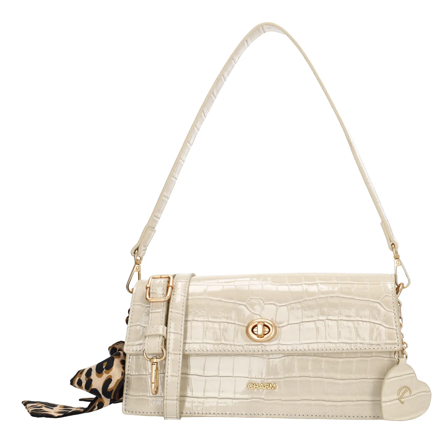 De Charm London Knightsbridge Schoudertas is een elegante eyecatcher met een stijlvolle croco laklook. Deze tas combineert een chique uitstraling met praktische details, perfect voor een avondje uit of een bijzondere gelegenheid.

De tas sluit met een ritssluiting en een overslag met kliksluiting voor extra veiligheid. Aan de binnenkant vind je een ritsvak en een telefoonvak, zodat je je essentials georganiseerd kunt opbergen. De afneembare en verstelbare schouderband zorgt ervoor dat je de tas zowel over de schouder als crossbody kunt dragen.

Als extra detail is de tas voorzien van een charmante sleutelhanger in de vorm van een hartje met spiegeltje én een speels sjaaltje.

Kenmerken:


Croco laklook met overslag en kliksluiting

Ritssluiting voor extra veiligheid

Ritsvak en telefoonvak aan de binnenkant

Afneembare en verstelbare schouderband

Hartvormige sleutelhanger met spiegel

Voorzien van een decoratief sjaaltje