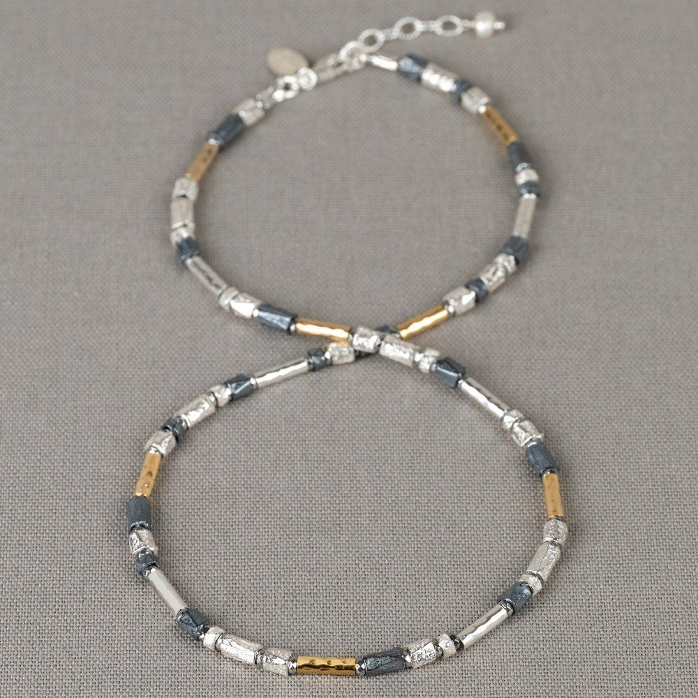 Zilveren collier gemaakt van zilver + geoxideerd zilver en goldfilled Buisjes