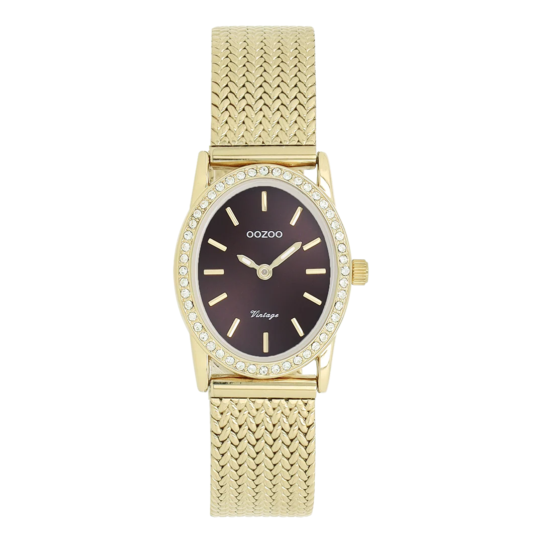 De klassieke look blijft centraal staan ​​in deze trendy serie en daarom is dit ovale OOZOO vintage design met een speelse knipoog dé must-have van het seizoen! Dit dameshorloge combineert mode en comfort met een 28x23 mm goudkleurige metalen kast met kristallen en een figrode sunray wijzerplaat. De goudkleurige metalen V-mesh band maakt dit horloge tot een trendy accessoire dat je elke dag kunt dragen. De wijzerplaat heeft goudkleurige streepjescijfers en bijpassende wijzers. Het C20433-horloge geeft je outfit een sprankeling. Het mineraalglas ligt in een 1,8 mm dunne metalen horlogekast met IP-coating. Dit design heeft een roestvrijstalen achterplaat en is nikkelvrij. Dit horloge heeft een 2ATM Japans uurwerk en wordt geleverd met 2 jaar garantie