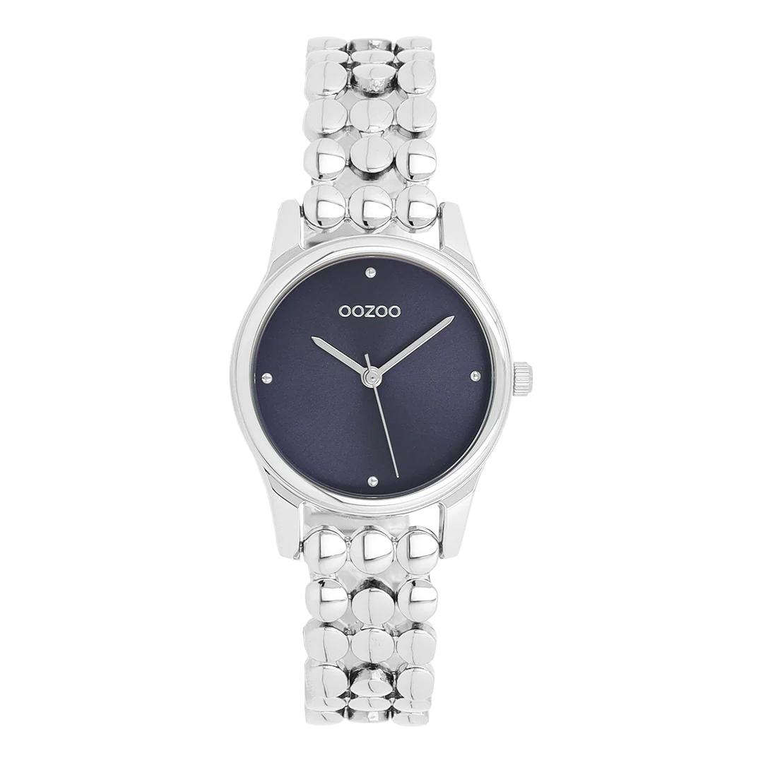 Val op met dit prachtige ronde dameshorloge uit de trendy OOZOO Timepieces-collectie. De C11630 heeft een glanzende zilverkleurige schakelband en een 28 mm zilverkleurige metalen horlogekast. Maak een echt fashion statement met deze blauwe sunray wijzerplaat, zilverkleurige stippen en bijpassende wijzers. Dit onmisbare horloge voor je garderobe heeft mineraalglas, een roestvrijstalen achterplaat en is nikkelbestendig. Dit horloge heeft een 2ATM Japans uurwerk en wordt geleverd met 2 jaar garantie 