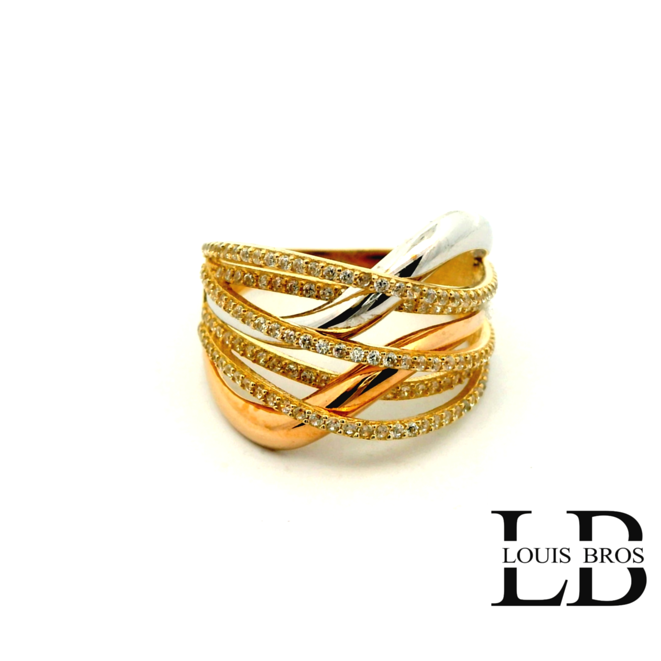 Deze schitterende ring is vervaardigd uit 14 karaat tricolor goud (4.43 gr), waarbij geel-, wit- en rosegoud op elegante wijze samenkomen. Het speelse kleurenspel geeft de ring een unieke en luxe uitstraling. De ring is verder verrijkt met fonkelende zirkonia’s, die zorgen voor een sprankelende schittering bij iedere beweging.

Een tijdloos en stijlvol sieraad dat perfect is voor dagelijks gebruik, maar ook bijzonder mooi bij feestelijke gelegenheden. Dankzij de combinatie van drie goudkleuren laat de ring zich makkelijk combineren met andere sieraden.

 Materiaal: 14 karaat goud (tricolor: geel, wit & rosé)
 Steen: Zirkonia
 Stijl: Elegant, luxe en veelzijdig.
De ring is verkrijgbaar in meerdere afmetingen.