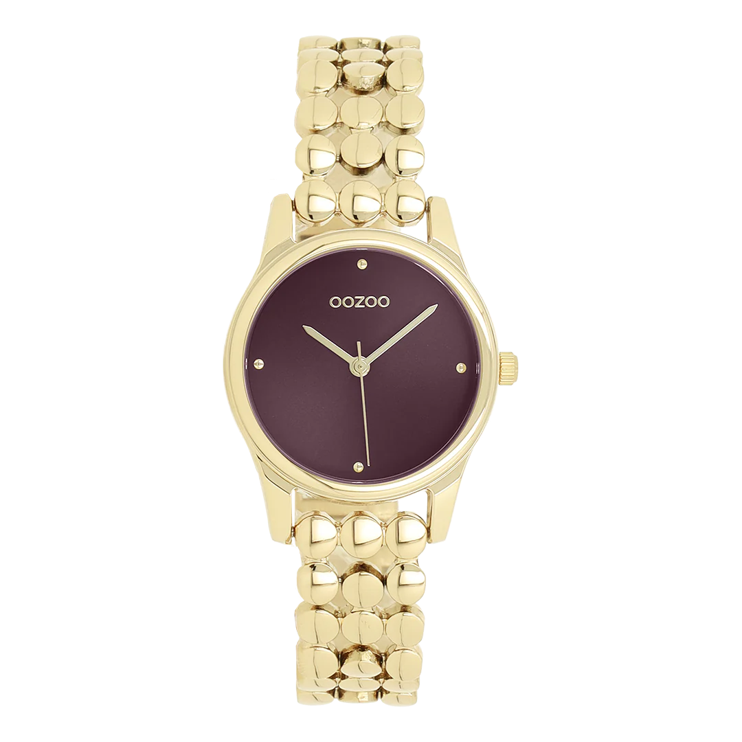 Val op met dit prachtige ronde dameshorloge uit de trendy OOZOO Timepieces-collectie. De C11633 heeft een glanzende goudkleurige schakelband en een 28 mm goudkleurige metalen horlogekast. Maak een echt fashion statement met deze figrode sunray wijzerplaat, goudkleurige stippen en bijpassende wijzers. Dit onmisbare horloge voor je garderobe heeft mineraalglas, een roestvrijstalen achterplaat en is nikkelbestendig. Dit horloge heeft een 2ATM Japans uurwerk en wordt geleverd met 2 jaar garantie.