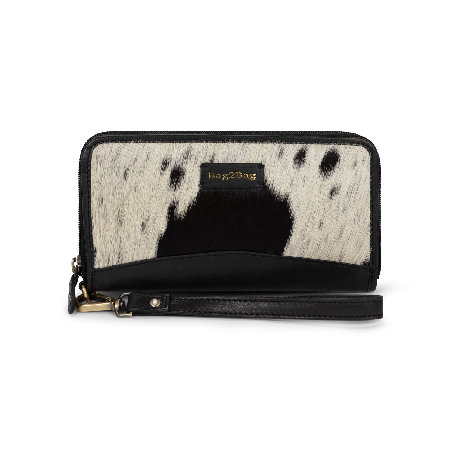 De Bag2Bag Porto is een stijlvolle en praktische portemonnee, gemaakt van hoogwaardig leer en afgewerkt met unieke koeienhuid. Geen enkele portemonnee is hetzelfde – iedere Porto heeft zijn eigen karakter en patroon.Het compacte ontwerp biedt verrassend veel ruimte voor al je pasjes, muntgeld en briefgeld. Binnenin vind je meerdere vakken, een ritsvakje voor muntgeld en een ruim vak voor briefgeld. Ook heeft de portemonnee een handig vak met doorzichtige houder voor je ID-kaart. Aan de achterkant zit nog een extra ritsvakje.

Afmeting: 15 x 10 x 3 cm