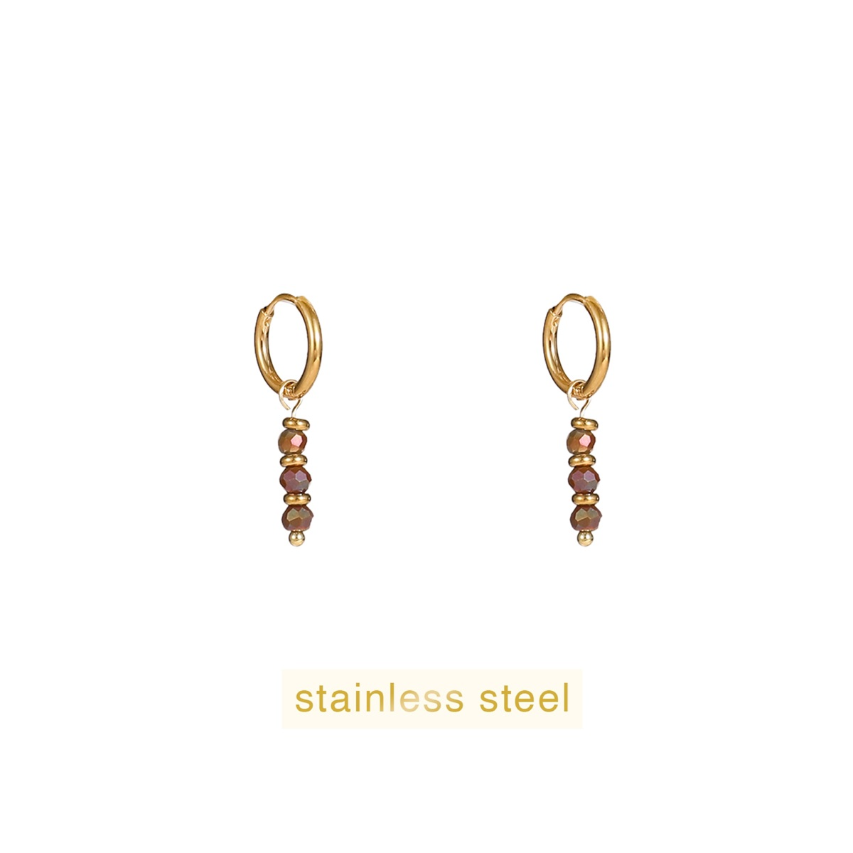 De Day & Eve oorringen Triple Bead Hoop + coffee, modelnummer E56143-4. Deze elegante oorringen zijn perfect voor zowel dagelijkse als avondkleding. Combineer ze met bijpassende sieraden voor een complete look of draag ze solo voor een subtiele, maar verfijnde uitstraling.