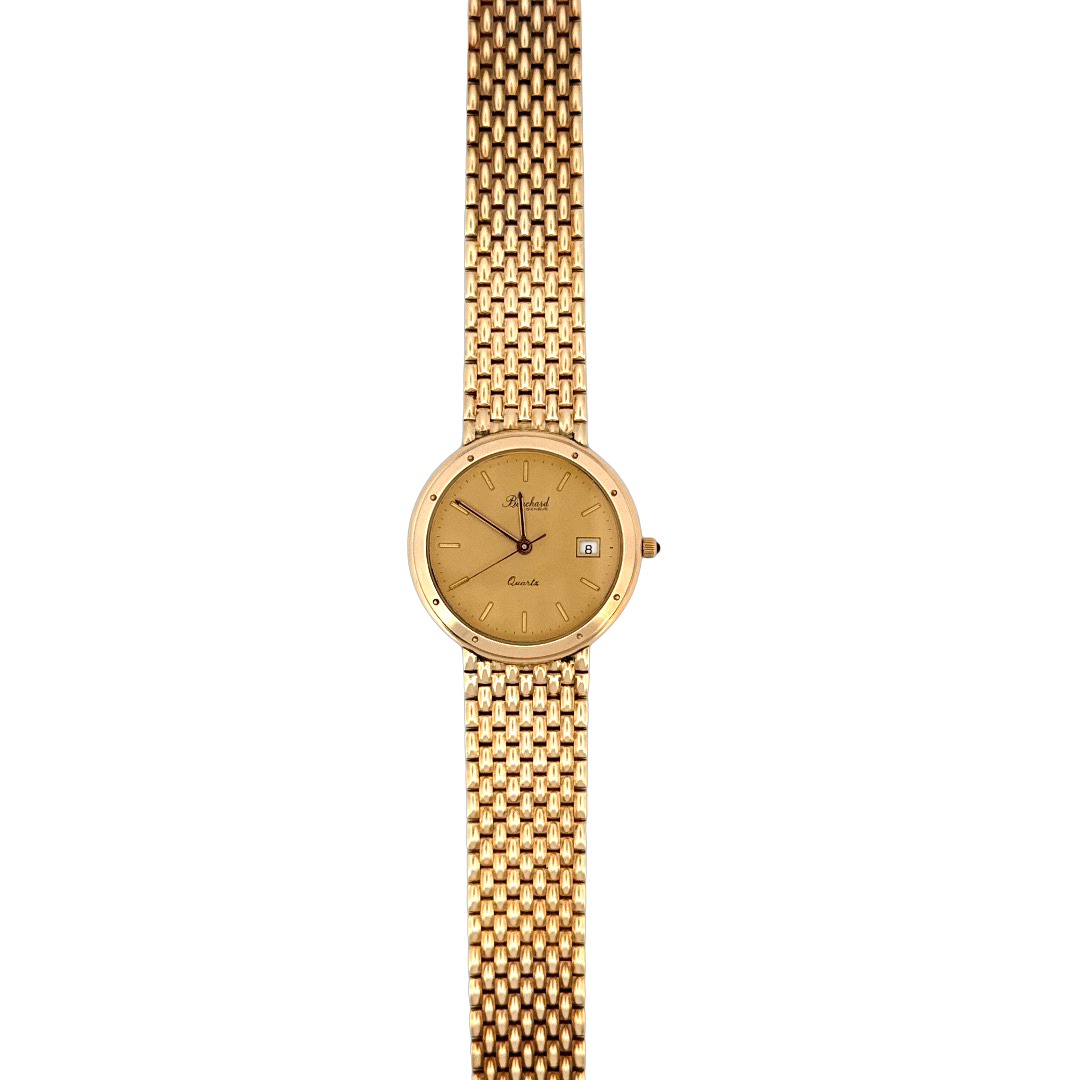 De Bouchard Genevé Horloge 14krt Geelgoud 10530 is een luxueus herenhorloge, met Zwitsers kwartsuurwerk, analoge wijzerplaat en datumfunctie. Het horloge heeft een 34 mm ronde goudkleurige kast, Milanees mesh bandje van echt goud, en een kristallen glas. Perfect voor zowel formele als casual gelegenheden, draag hem voor een verfijnde, stijlvolle uitstraling.