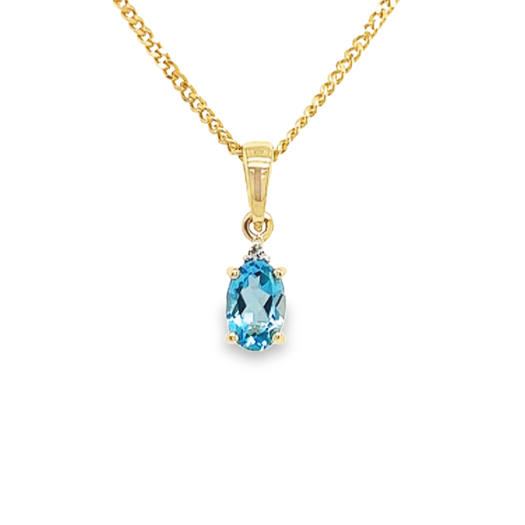 Gouden hanger met Swiss Blue Topaas en Diamant