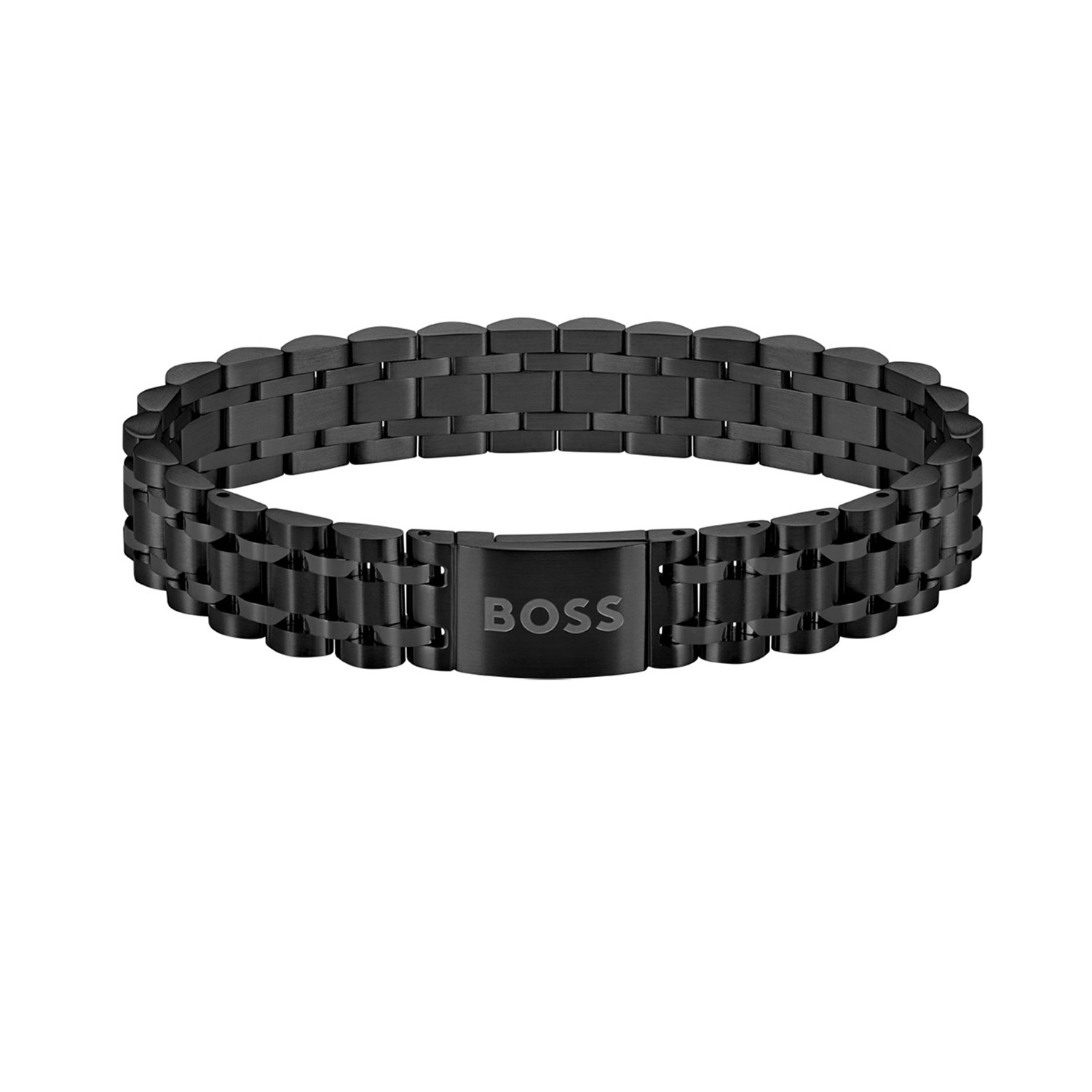 Deze armband van BOSS uit de OWAN serie is een stoer sieraad voor de echte BOSS klant. De stalen zwarte armband heeft een  fijne mat glanzende schakelband en sluit met een magneetsluiting. In het midden van de armband zit een zwarte tussenschakel die goed opvalt in het geheel. Op de schakel staat het BOSS logo gegraveerd. De armband heeft een lengte van 19cm en is goed te combineren met andere sieraden van BOSS.