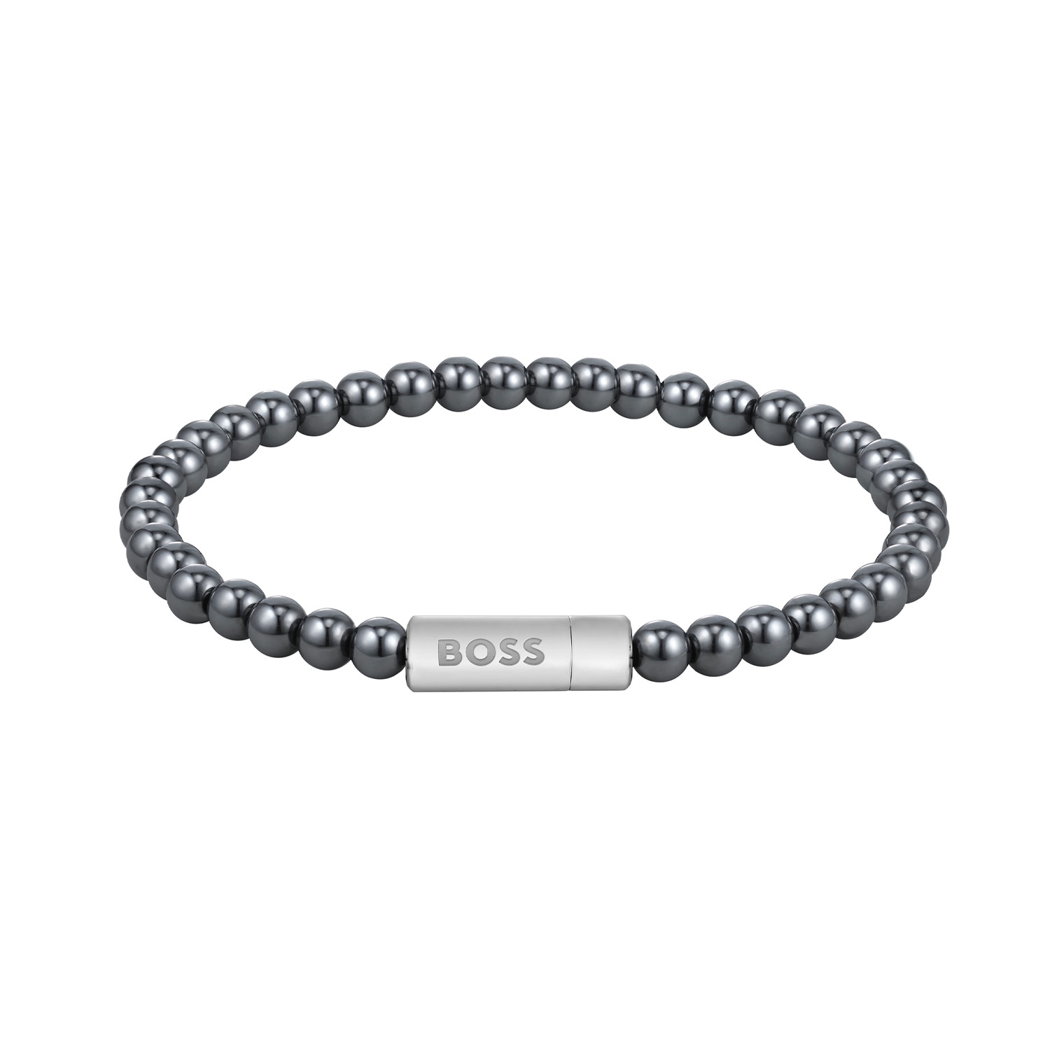 Deze armband van BOSS uit de SPHERE BEADS serie is een opvallend sieraad voor de echte BOSS klant. De armband heeft grijze hematiet kralen van 5mm geregen op staaldraad. Met de stalen magneetsluiting met het Logo is dit een mooi geheel. De lengte is 19cm. Zeker goed te combineren met de bijpassende sieraden van BOSS. 
