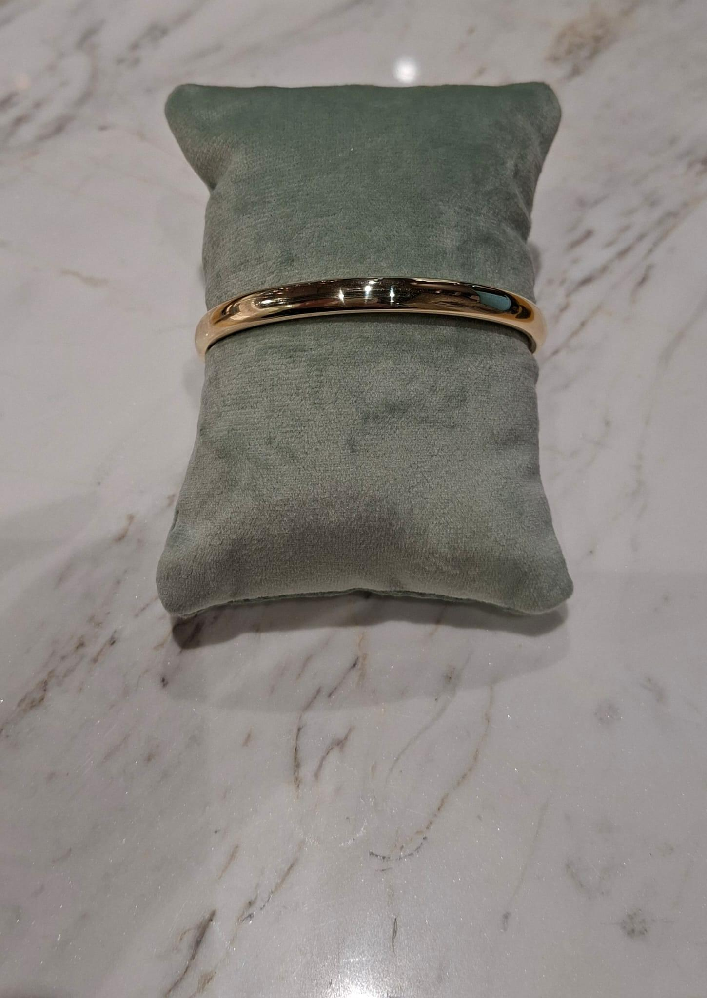 OCC-BANGLE6MM/62. Geelgouden bangle occasion 14 karaat. 6mm/62mm. 585/1000