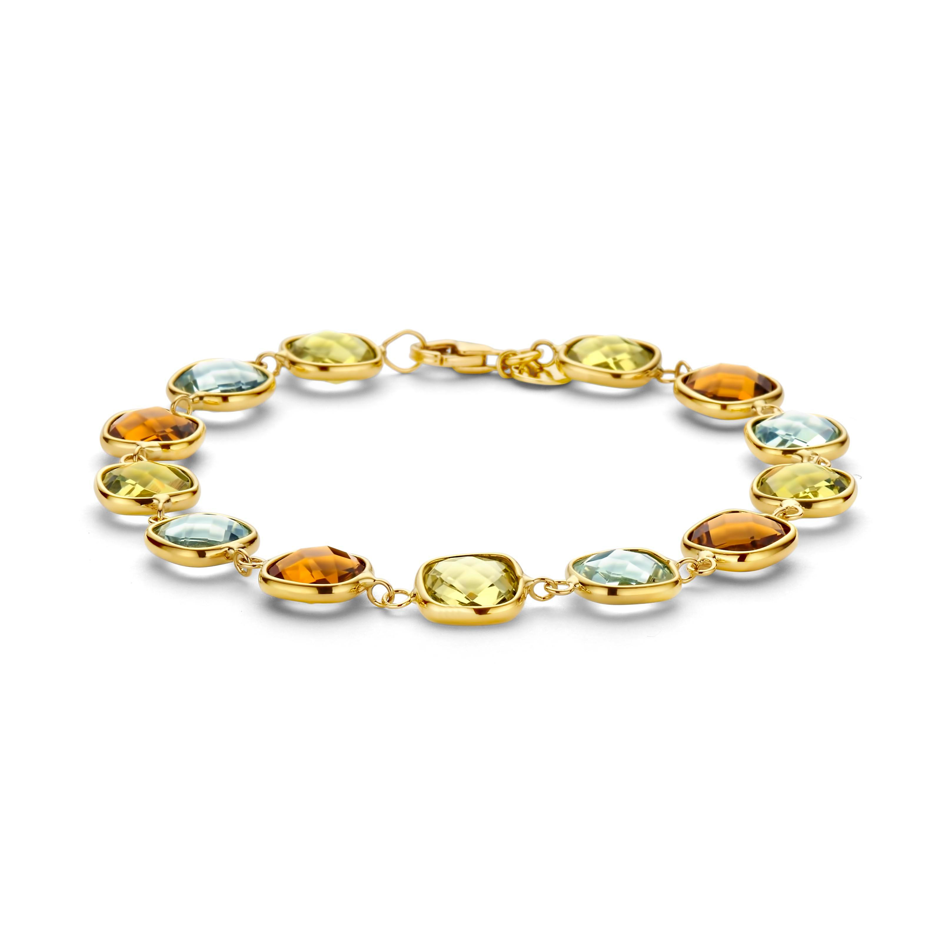 Prachtige gouden armband in warme kleuren, peridot en kwarts.
Lengte 19 cm