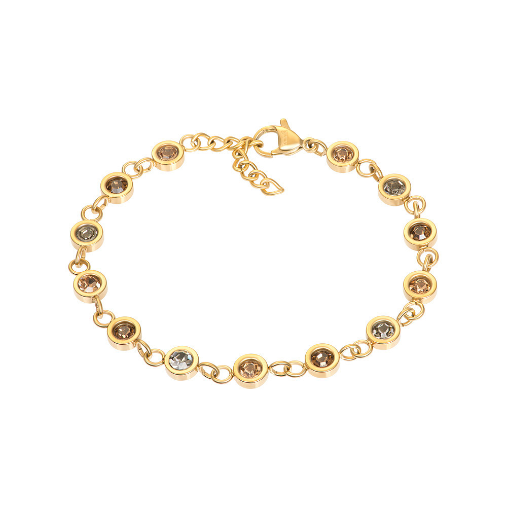 De iXXXi armband Viva Topaz is gemaakt van stainless steel. De armband bestaat uit ronde cupjes die met ringetjes aan elkaar zijn bevestigd. De cupjes zijn gevuld met sprankelende zirconia&rsquo;s in warme, neutrale aardetinten, wat de armband een verfijnde en warme look geeft.