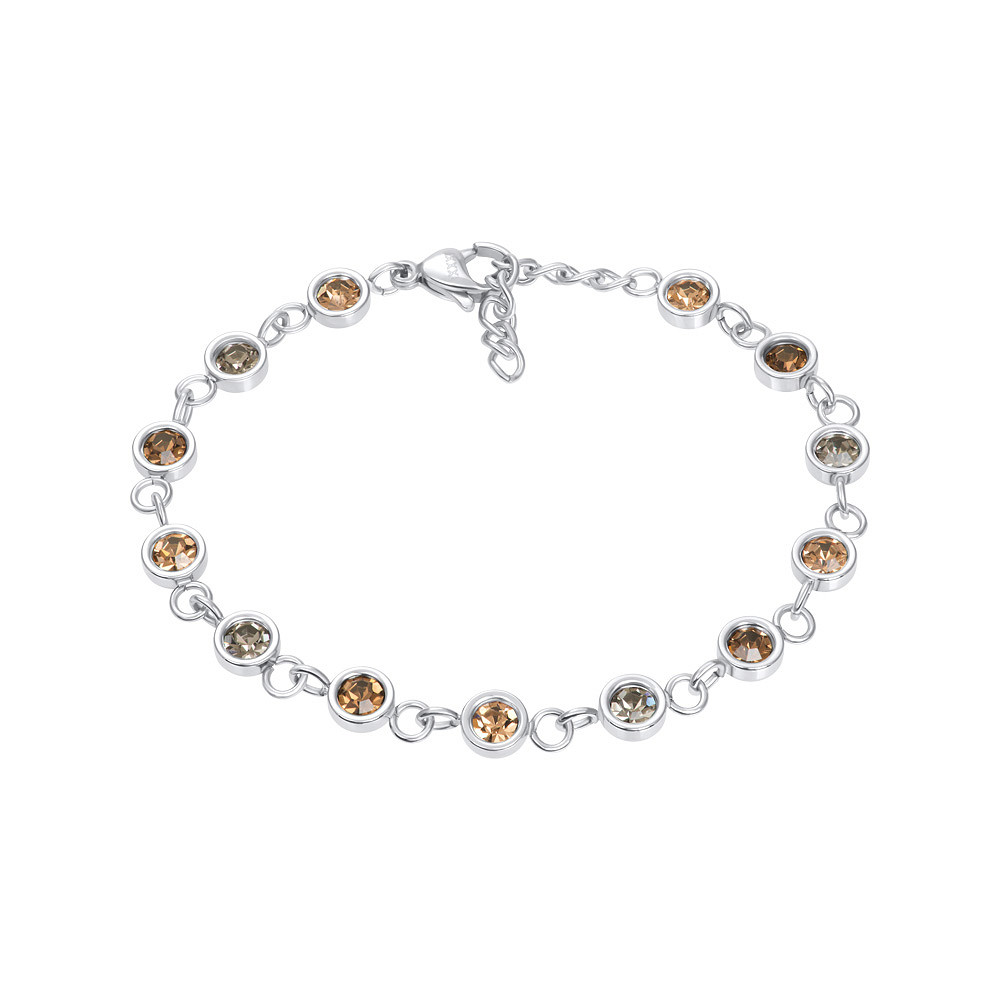 De iXXXi armband Viva Topaz is gemaakt van stainless steel. De armband bestaat uit ronde cupjes die met ringetjes aan elkaar zijn bevestigd. De cupjes zijn gevuld met sprankelende zirconia’s in warme, neutrale aardetinten, wat de armband een verfijnde en warme look geeft.