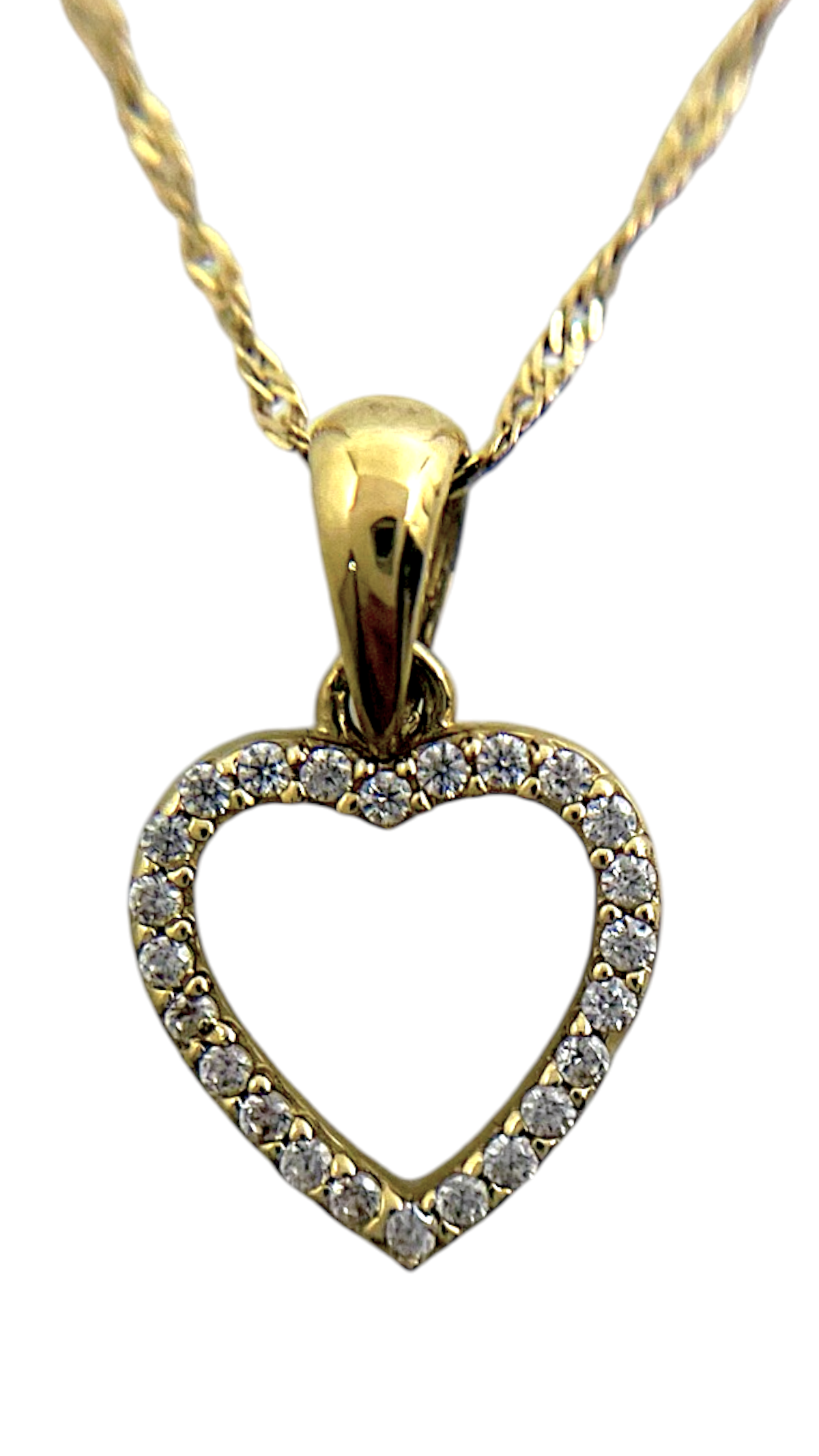 De COLLIER SINGAPORE HART is een verfijnde gouden ketting van het type Singapore, ontworpen voor elegantie. Perfect om alleen te dragen of te combineren met andere sieraden voor een gelaagde look. De ketting heeft een lengte van 50 cm, ideaal voor een chique en stijlvolle uitstraling. Draag het bij formele of casual outfits voor een vleugje luxe.