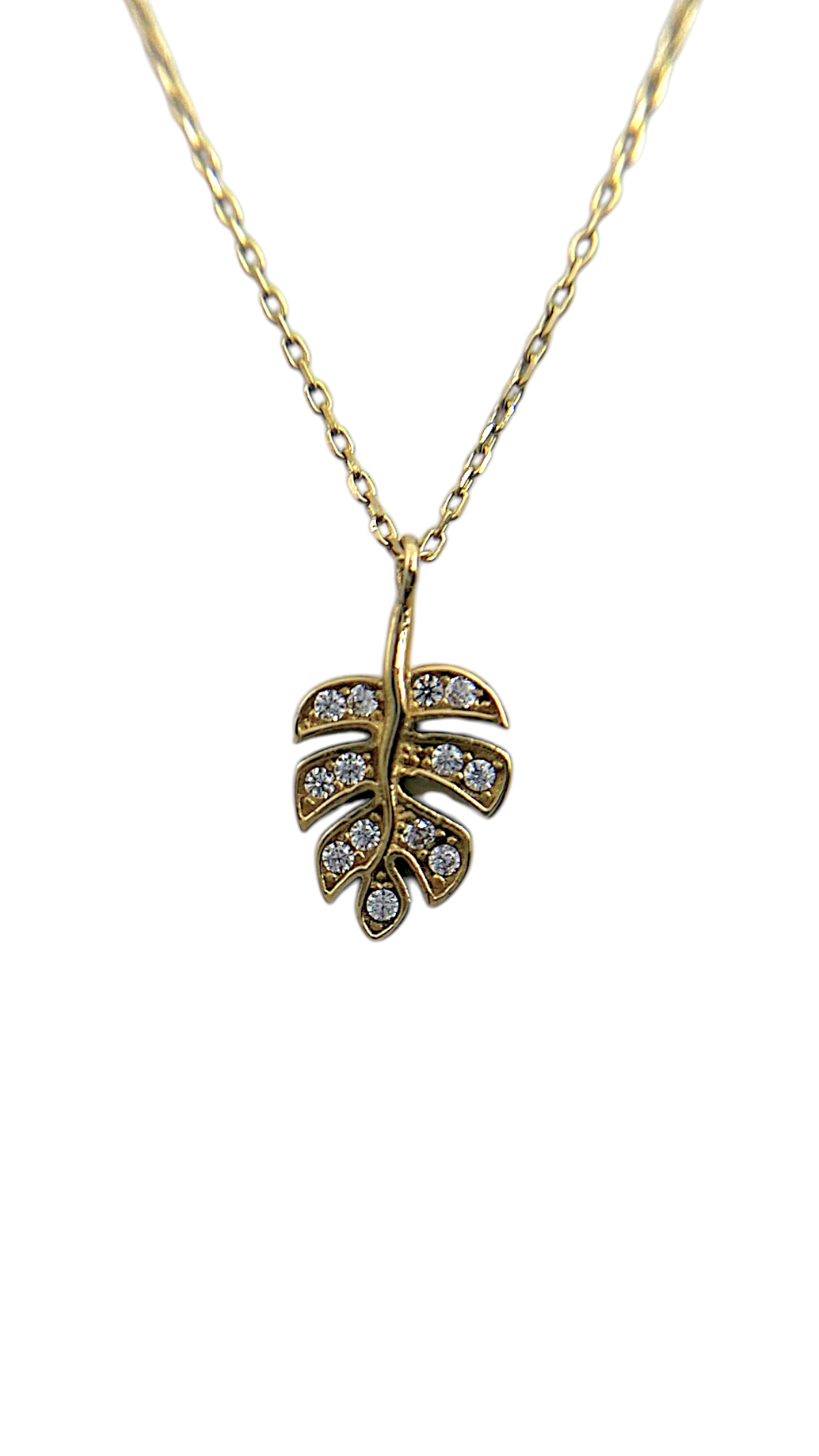 Deze prachtige Collier Leaf gouden ketting, straalt elegantie uit met een 14 karaat gouden afwerking. Dit juweel van het type NEKCLACE heeft een lengte van 45 cm. Draag het solo voor een verfijnde look of laag met andere kettingen voor een trendy en compleet statement. Perfect voor elke gelegenheid!