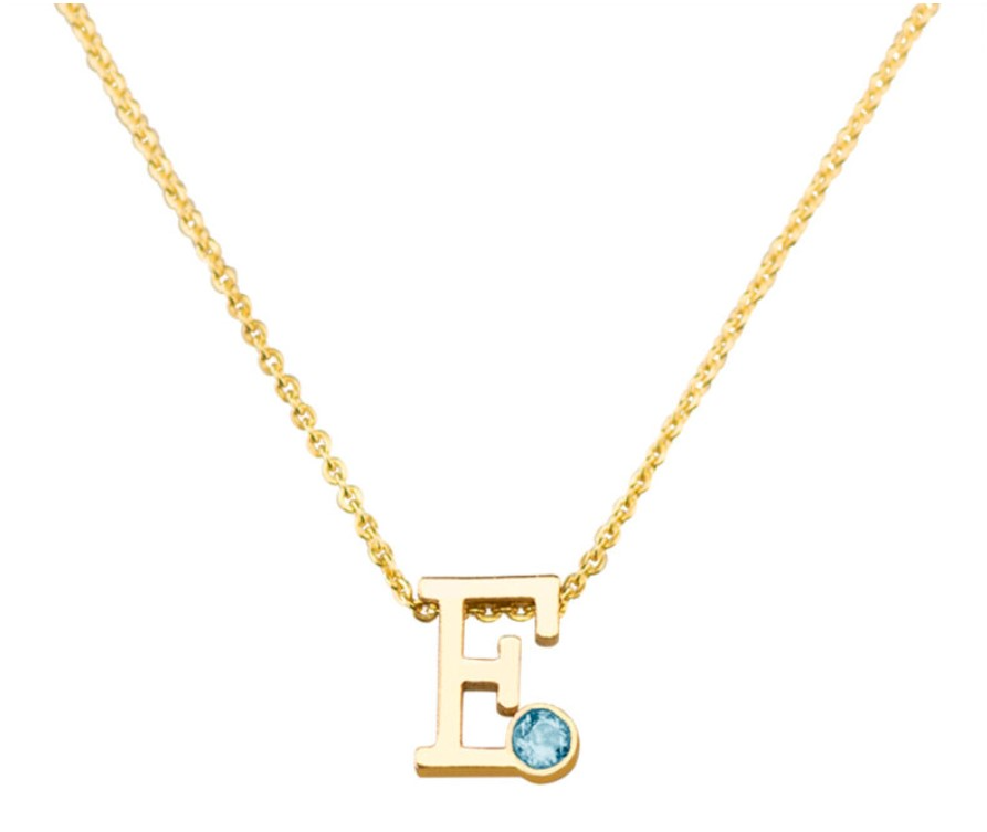 Initial, inclusief collier. Rechts onder zit een klein, rond compartimentje waar een kleine hoeveelheid as of moedermelk in aangebracht kan worden.