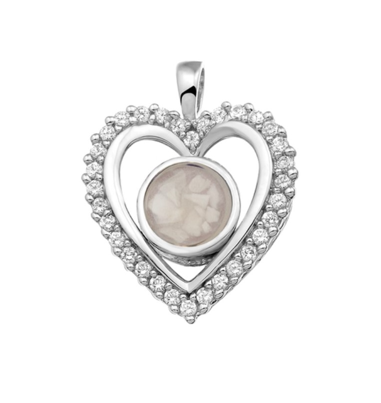 Klassieke hart hanger met zirkonia of diamant. Dit sieraad wordt zichtbaar aan de voorkant gevuld met as, moedermelk of haar en wordt vermengd met onze speciale hars.