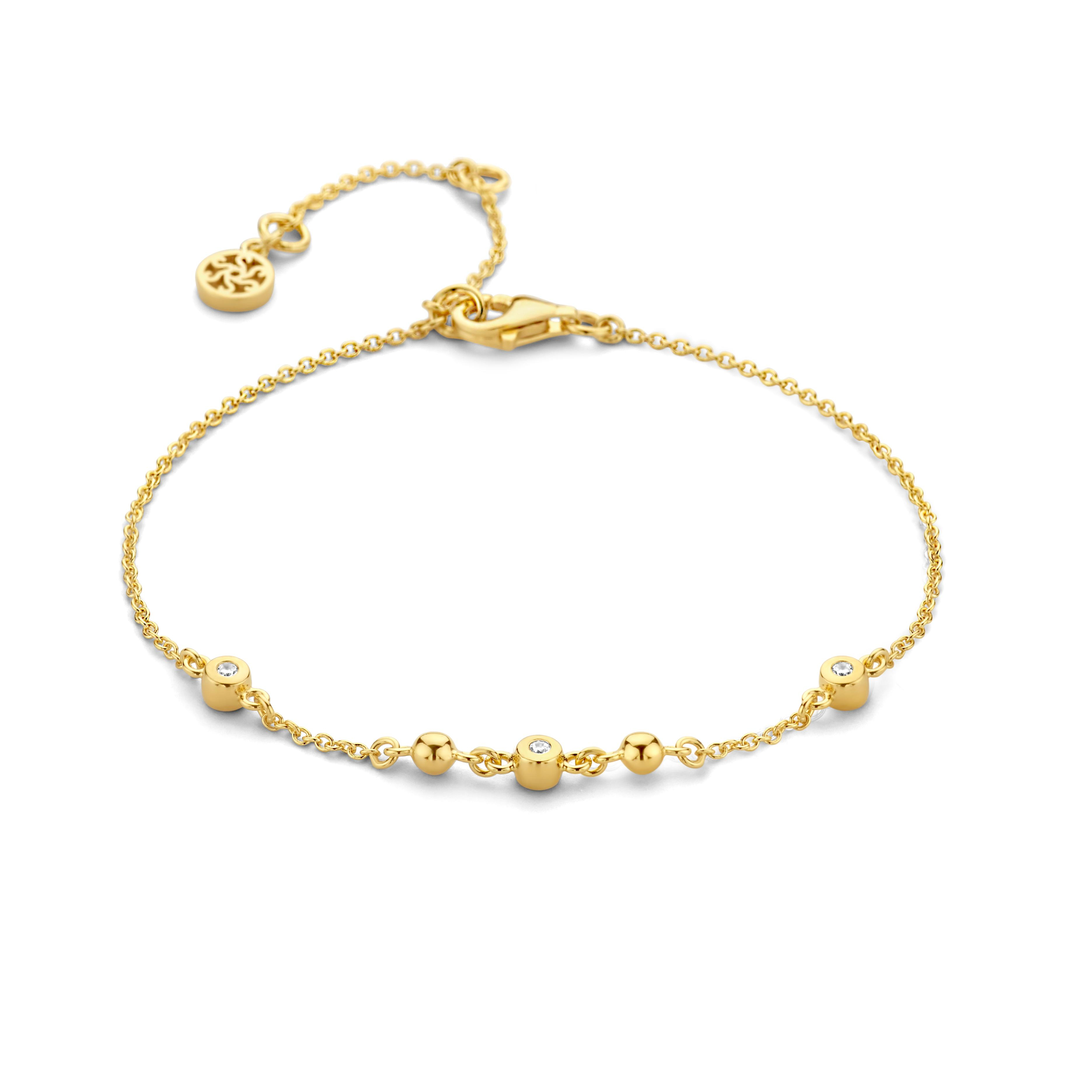  Tragen Sie dieses elegante 925/- vergoldete Armband mit Zirkonia Steinen zu besonderen Anlässen oder verleihen Sie Ihrem Alltagslook einen Hauch von Raffinesse. Die Länge ist variabel zwischen 17,19 und 21 cm. Kombinieren Sie sie mit Ihrem Lieblingskleid oder einem schicken Oberteil und lassen Sie sie Ihr Outfit perfekt ergänzen. Ideal für modische Akzente.