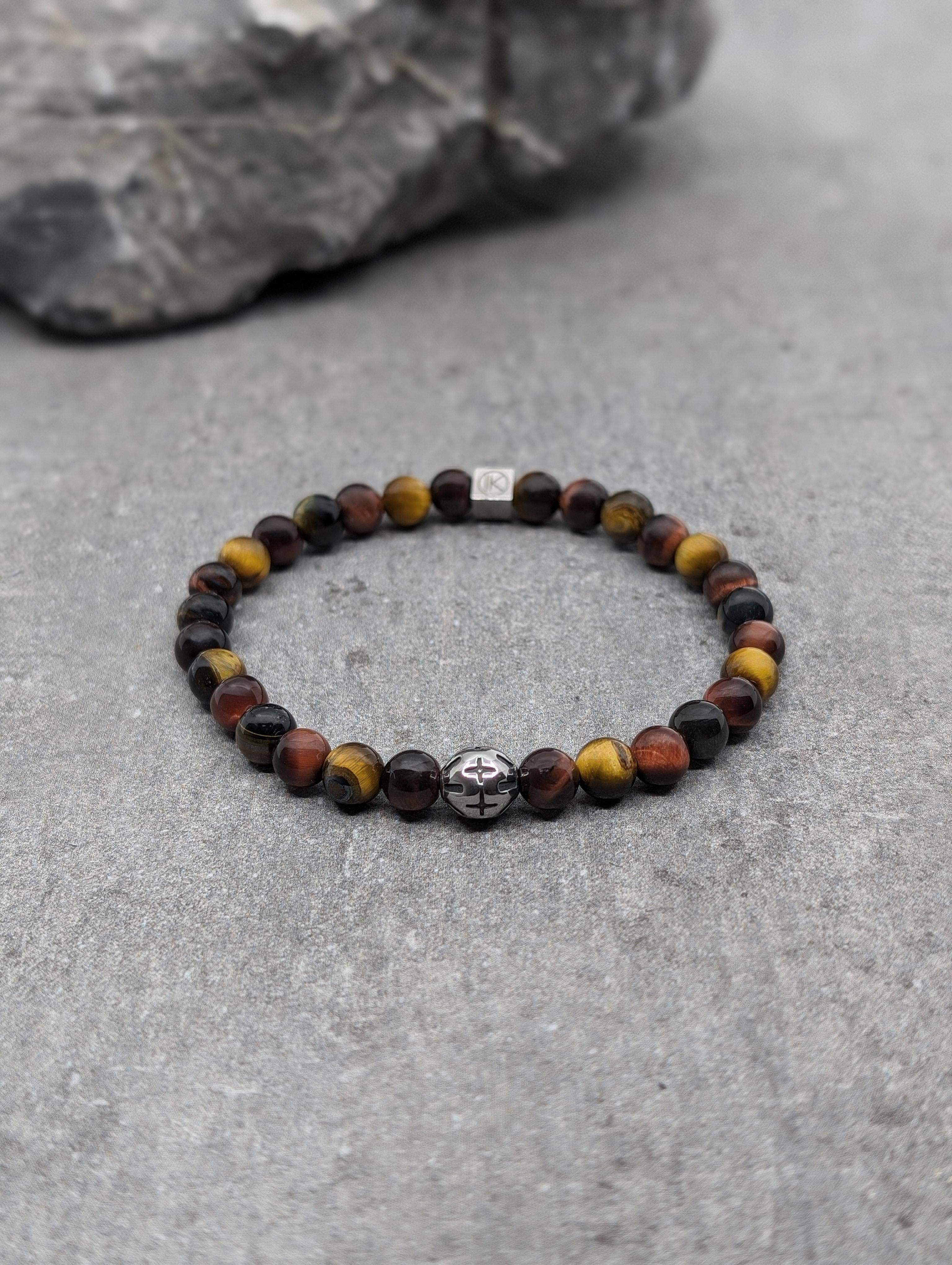 Armband met 3 soorten ogen: tijger, stier en valk en stalen bolletje