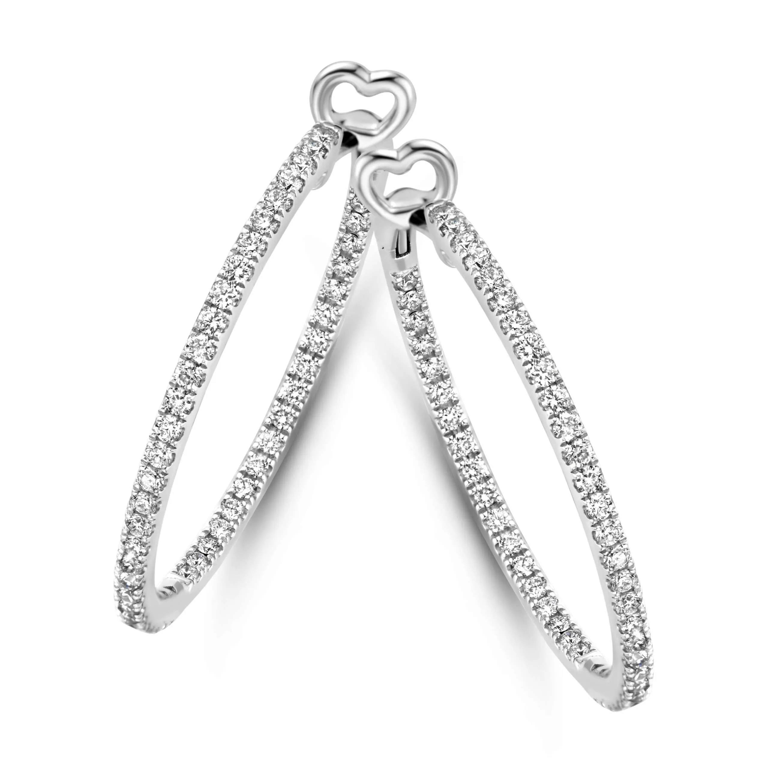 Tirisi Jewelry Amsterdam Due oorringen, modelnummer TE9312DW, zijn stijlvolle creolen. Deze oorbellen voegen elegantie toe aan elke outfit en zijn ideaal voor zowel formele als casual gelegenheden. Het beste gedragen als een opvallend sieraad, passen ze perfect bij zowel opgestoken haar als los haar voor een verfijnde look. Een must-have toevoeging aan je sieradencollectie.