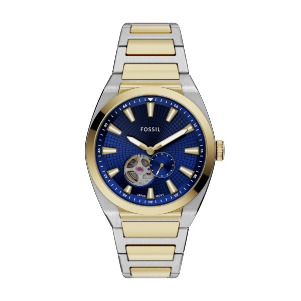 De Everett Automatic straalt moeiteloze stijl uit. Dit sportieve horloge in twee kleuren, uitgevoerd in goud en roestvrij staal, combineert casual cool met verfijnde verfijning. De sunrayblauwe open hartvormige wijzerplaat, gevat in een ronde roestvrijstalen kast van 42 mm, zorgt voor een vleugje moderne inspiratie. Aangedreven door een automatisch uurwerk, zichtbaar door de wijzerplaat en de achterkant van de kast. Dit horloge houdt de tijd bij zonder batterij en benadrukt het complexe mechanisme in zijn ontwerp. Trek dit iconische accessoire aan en ga de strijd aan met alles wat op je pad komt.