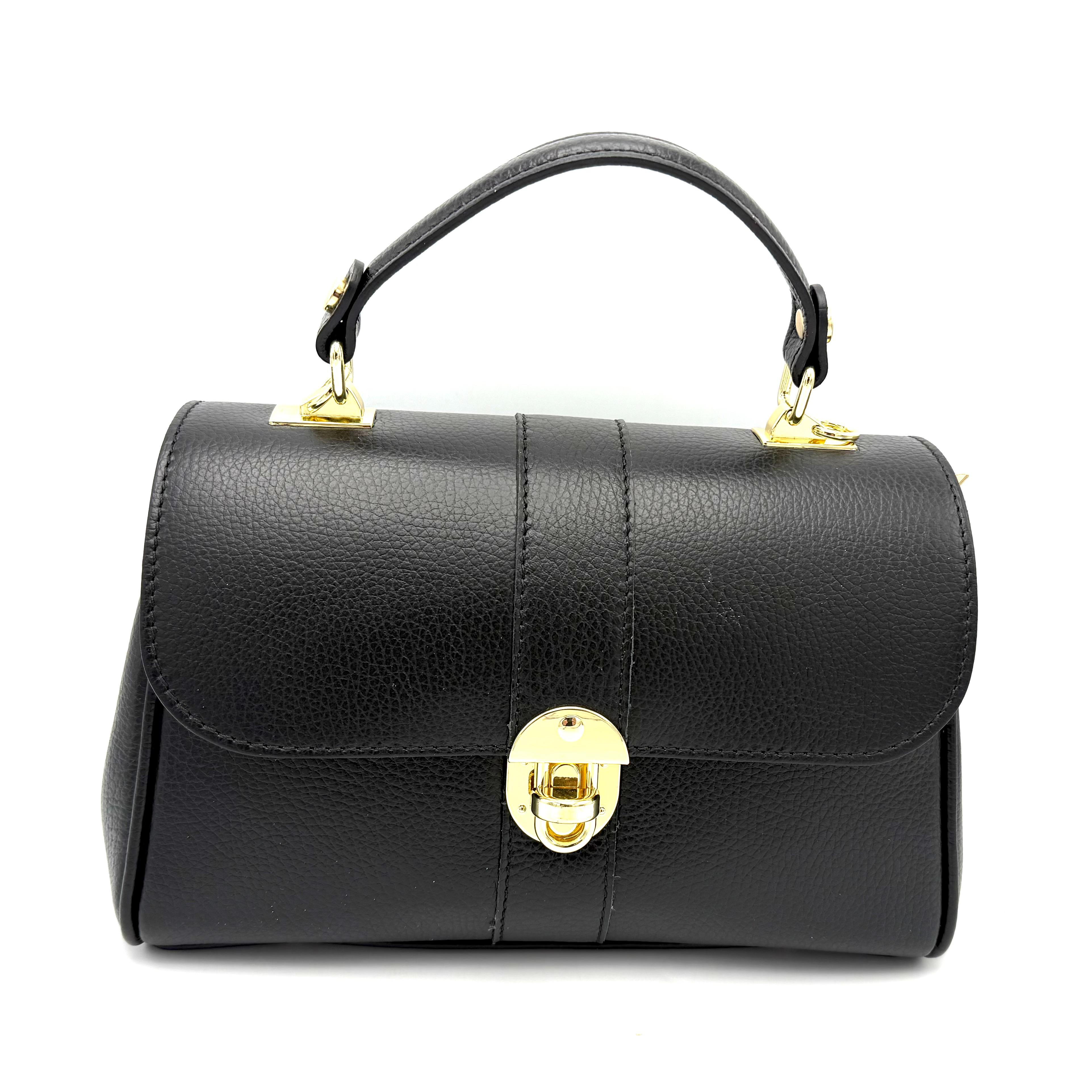 Luxe Italiaanse Handtas van Dollaro Leer – Zwart

Ontdek de perfecte combinatie van elegantie en functionaliteit met deze Italiaanse handtas van hoogwaardig dollaro leer. Deze tas is ontworpen voor de moderne vrouw die stijl en praktisch gebruik wil combineren.

De tas kan zowel in de hand als crossbody gedragen worden dankzij de afneembare en verstelbare schouderriem. De draaiende sluiting onderstreept de luxe uitstraling, terwijl de dubbele ritsvakken en het extra binnenvak met rits zorgen voor overzichtelijke opbergruimte.

Onder de klep vind je voldoende plaats voor je dagelijkse essentials – van telefoon en sleutels tot make-up of kleine accessoires. Dankzij de pootjes aan de onderkant blijft de tas stabiel en wordt het leer beschermd tegen slijtage.

De zwarte katoenen voering geeft een stijlvolle afwerking aan het interieur, en de compacte maar ruime afmetingen maken deze tas ideaal voor dagelijks gebruik:
Hoogte: 18 cm • Breedte: 26 cm • Diepte: 11 cm

Kenmerken:

Gemaakt in Italië van premium dollaro leer

Kan als handtas of crossbody gedragen worden

Afneembare, verstelbare schouderriem

Dubbel ritsvak met binnenvak met rits

Luxe draaiende sluiting

Zwarte katoenen voering

Beschermende pootjes aan de onderzijde

Waarom je deze tas wilt:
Deze Italiaanse leren handtas is tijdloos, elegant en praktisch – een investering die jarenlang meegaat. Perfect voor zowel werk, stadse uitstapjes als speciale gelegenheden.