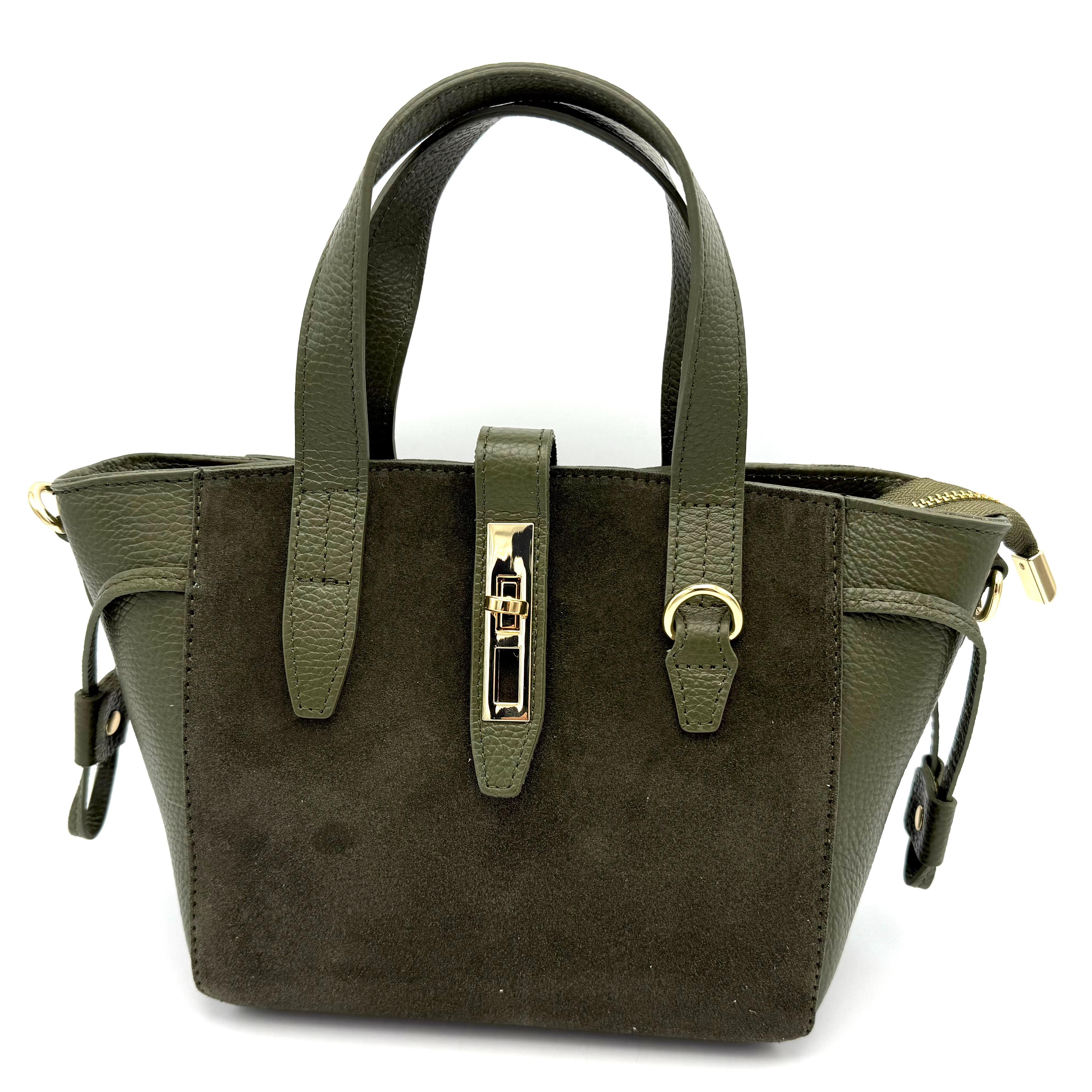 Luxe Italiaanse Handtas van Suède en Dollaro Leer – Elegant & Veilig Design

Ontdek tijdloze elegantie met deze handgemaakte Italiaanse tas, vervaardigd uit een verfijnde combinatie van suède en soepel dollaro leer. Deze tas straalt klasse en vakmanschap uit — een perfecte balans tussen luxe mode en dagelijks gebruiksgemak.

De tas is voorzien van een korte handgreep én een afneembare, verstelbare schouderriem, zodat je haar zowel in de hand, op de schouder als crossbody kunt dragen. De band met draaislot zorgt samen met de extra toprits voor een dubbele sluiting – veilig én stijlvol.

Binnenin vind je één ruim hoofdvak met een achterritsvak en een steekvak, ideaal voor het overzichtelijk opbergen van je essentials. De onderzijde is afgewerkt met beschermende pootjes, die het leer mooi houden en de tas een luxe afwerking geven.

Met haar elegante vorm, rijke materialen en Italiaanse flair is deze tas een echte eyecatcher — perfect voor zowel werk, stadse uitstapjes als avondgelegenheden.

Afmetingen (indien gewenst toe te voegen): Hoogte xx cm • Breedte xx cm • Diepte xx cm

Kenmerken:

Gemaakt in Italië van hoogwaardig dollaro leer en suède

Korte handgreep + afneembare, verstelbare schouderriem

Band met draaislot en extra toprits – extra veilig

Ruim hoofdvak met achterritsvak en steekvak

Beschermende pootjes aan de onderzijde

Elegant, modieus en tijdloos design

Waarom je deze tas wilt:
Deze Italiaanse leren handtas is de perfecte mix van elegantie, functionaliteit en veiligheid. De luxe materialen, het verfijnde ontwerp en de doordachte indeling maken dit een tas die elke outfit compleet maakt.

Afmetingen Hoogte 19cm x breed 21cm x diep 11cm