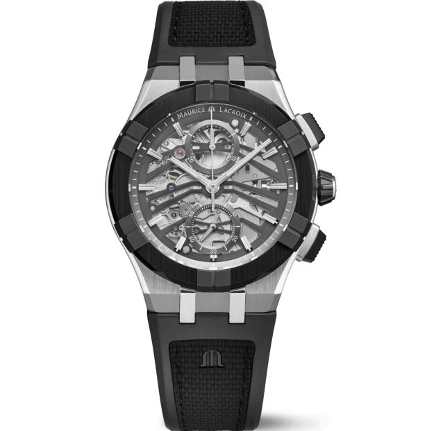 Maurice Lacroix - AC8018-SSL20-030-2

Bestel uw Maurice Lacroix Aikonic Automatic Chronograph Skeleton herenhorloge direct via www.juwelierhaesen.nl. Dit Maurice Lacroix Maurice Lacroix Aikonic NIEUW herenhorloge is bekend onder Maurice Lacroix-referentienummer AC8018-SSL20-030-2 en daarnaast onder het EAN: 7630020614814. Het horloge heeft een mechanisch uurwerk met automatische opwindfunctie dat geplaatst is in een edelstalen keramieken met kast. Op de (deels) doorzichtige wijzerplaat is analoge tijdsweergave zichtbaar. Aan de kast zit een zwarte kunststof horlogeband met een doorn- / gespsluiting.

Het mechanisch uurwerk met automatische opwindfunctie biedt u alleen de tijd als tijdfunctie(s). Daarnaast vindt u in het uurwerk een stopwatch-functie (chronograaf). De ronde horlogekast is 100m waterdicht en voorzien van een saffierglas.