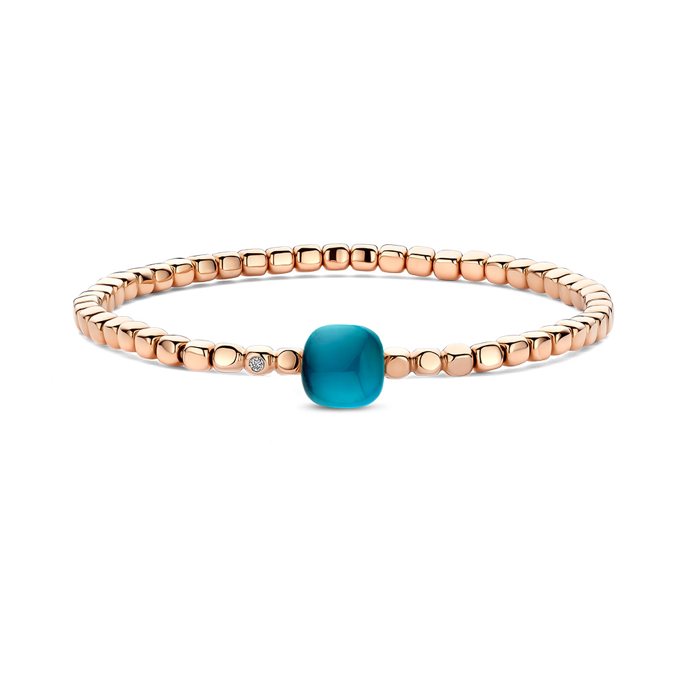 London Blue Lake
Mini Sweety Stretch armband
met blauwe topaas en parelmoer
