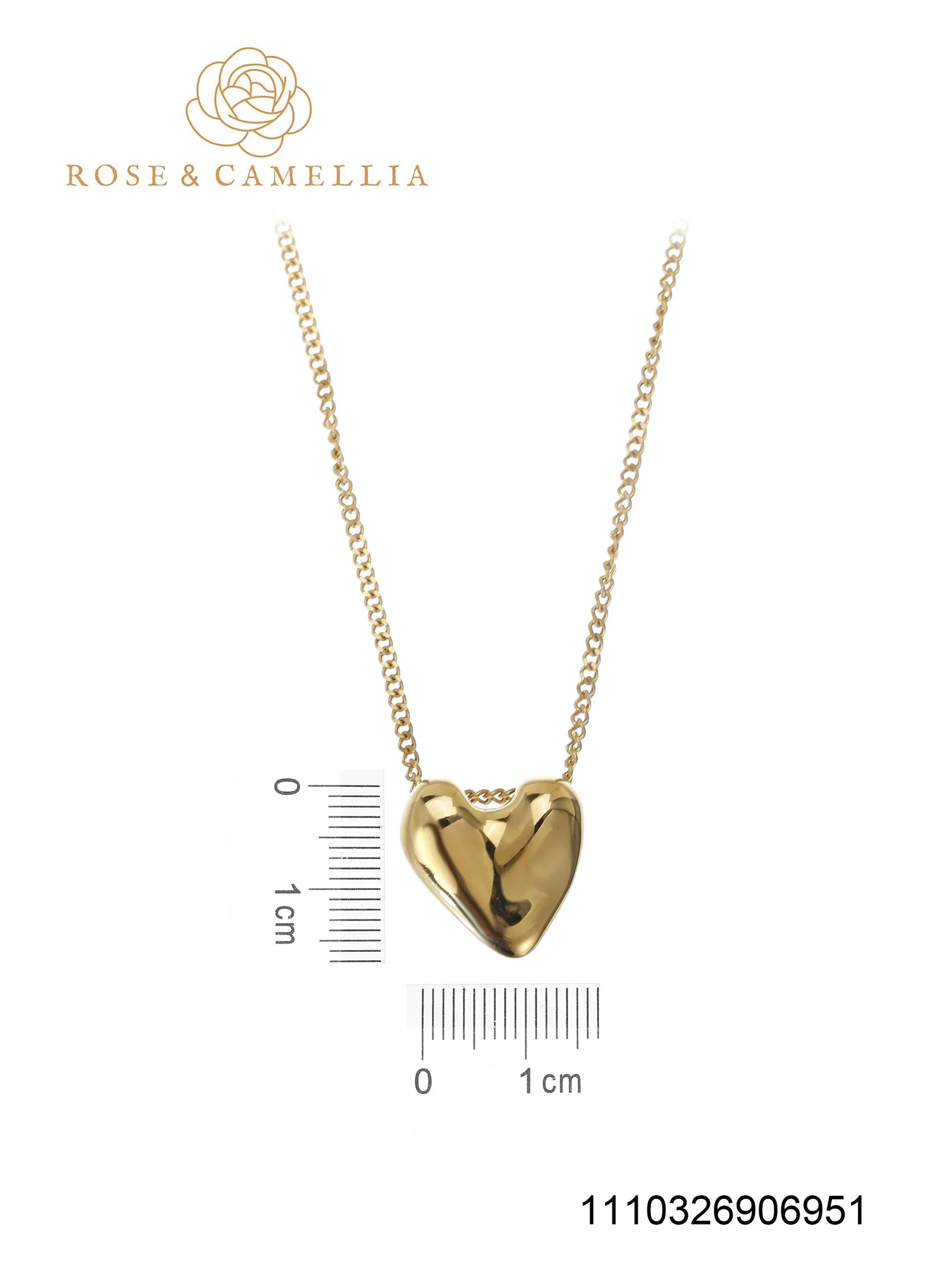 De Rose & Camellia Collier met modelnummer 1110326906951 is een verfijnde edelstalen ketting, verguld en 40+5 cm lang. Elegant gedragen bij zowel formele als casual outfits; perfect als accentstuk of in combinatie met andere sieraden. Zijn gouden glans en delicate design maken het een veelzijdige toevoeging aan elke garderobe.