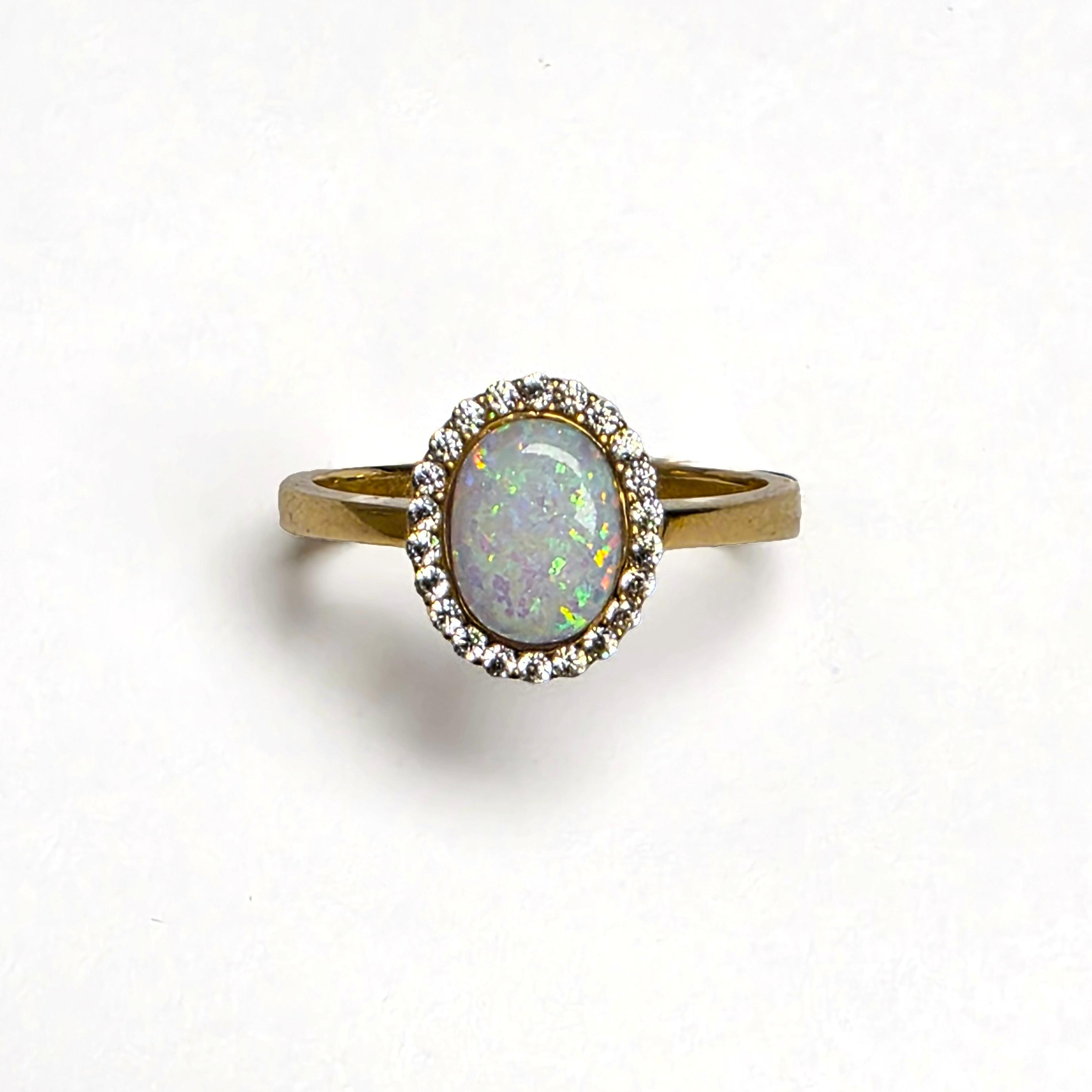 Gouden ring met imitatie Opaal en zirkonia