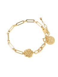 Het product Rose & Camellia Armband van edelstaal, verguld, modelnummer 2900016712509, is een verfijnde armband die perfect past bij elke elegante outfit. 