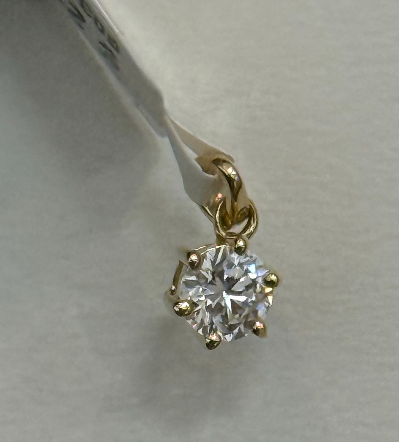14 krt gouden hanger met 0.25ct. lab grown diamant IGI gecertificeerd.