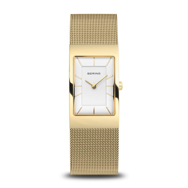  Tijdloze elegantie in goud  Dit dameshorloge uit de BERING Classic collectie combineert minimalistisch design met luxe uitstraling. De rechthoekige kast van gepolijst goudkleurig roestvrij staal (22 mm breed, 38 mm lang, 7 mm hoog) omlijst een witte wijzerplaat, beschermd door vlak, krasbestendig saffierglas.  De gouden Milanese band (22 mm breed, 227 mm lang) met vouwsluiting sluit perfect om de pols en biedt comfort en elegantie. Met quartz uurwerk en waterdicht tot 3 ATM &ndash; een stijlvolle keuze voor elke gelegenheid. 