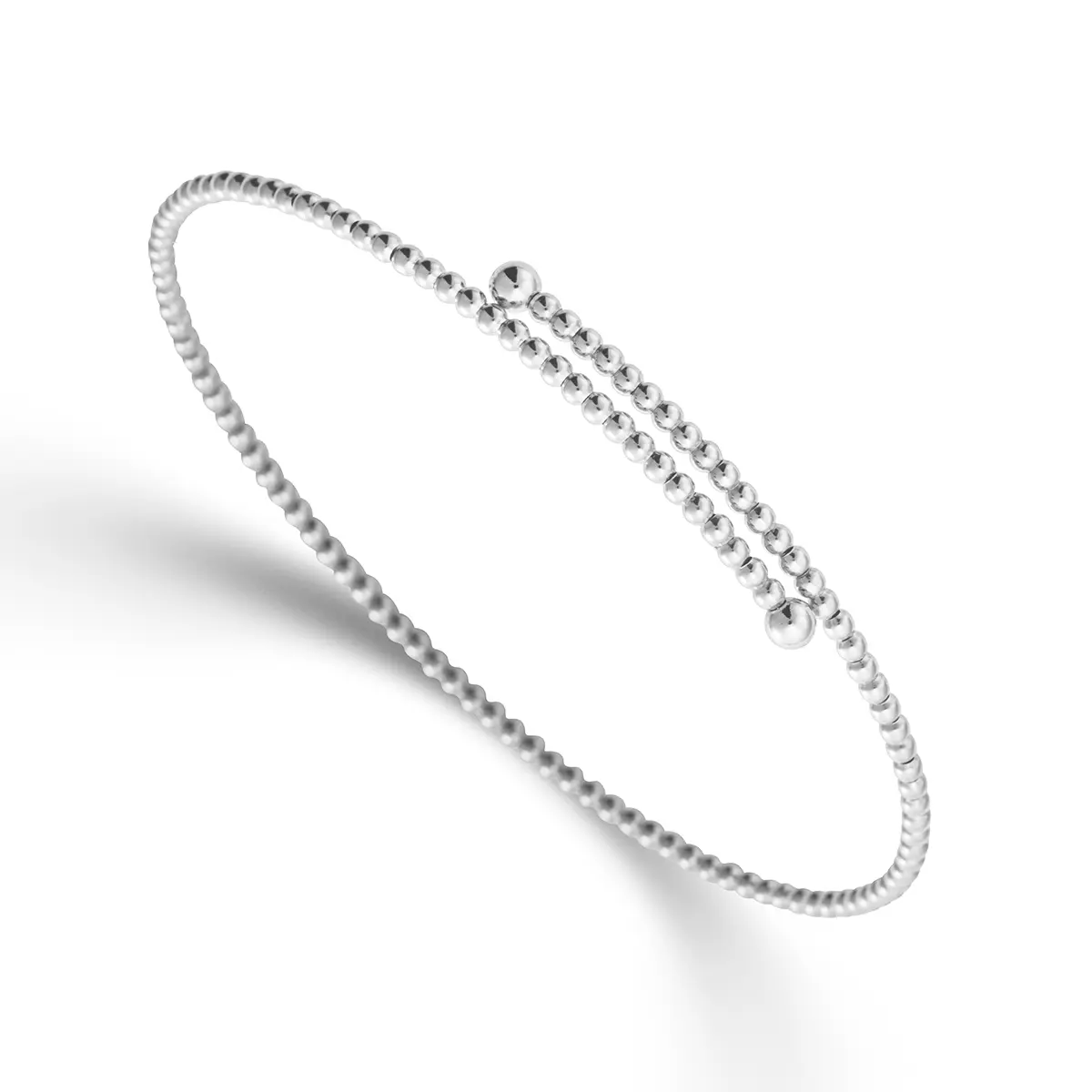 De Palido Wit gouden bangle is een elegante armband van witgoud. Deze subtiele en verfijnde armband voegt een vleugje luxe toe aan elke outfit. Het beste te dragen als stijlvol accessoire bij zowel casual als formele gelegenheden, en perfect te combineren met andere gouden sieraden voor een gelaagde look.