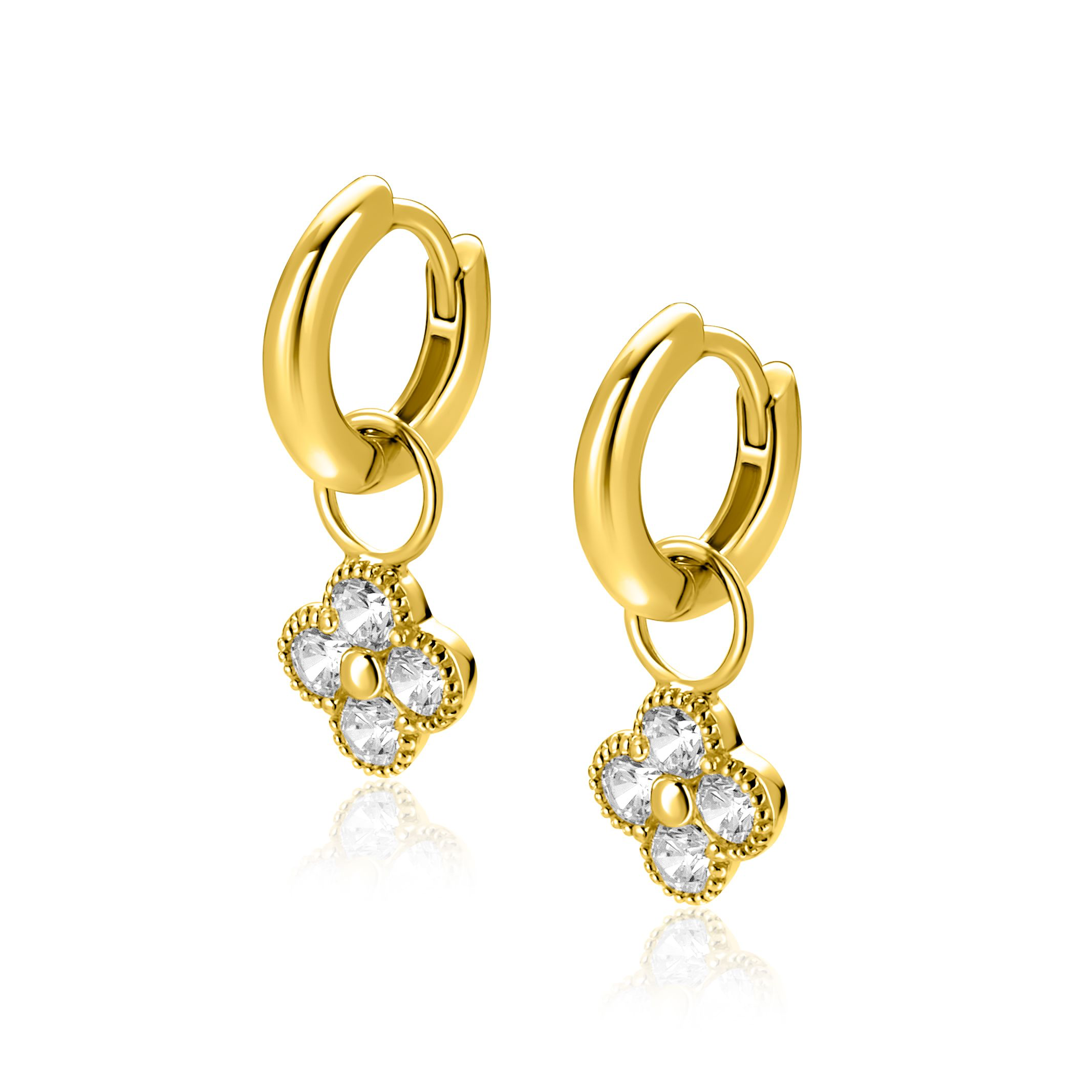 De ZINZI ZICH2735Y oorbellen zijn prachtige elementen in de categorie sieraden. Ze zijn voorzien van een vergulde klaver en sprankelende zirconia's voor een elegante uitstraling. Deze oorbellen kunnen het beste worden gedragen bij zowel casual als formele gelegenheden om een vleugje glamour toe te voegen aan elke outfit. Ideaal voor dagelijks gebruik of speciale momenten.