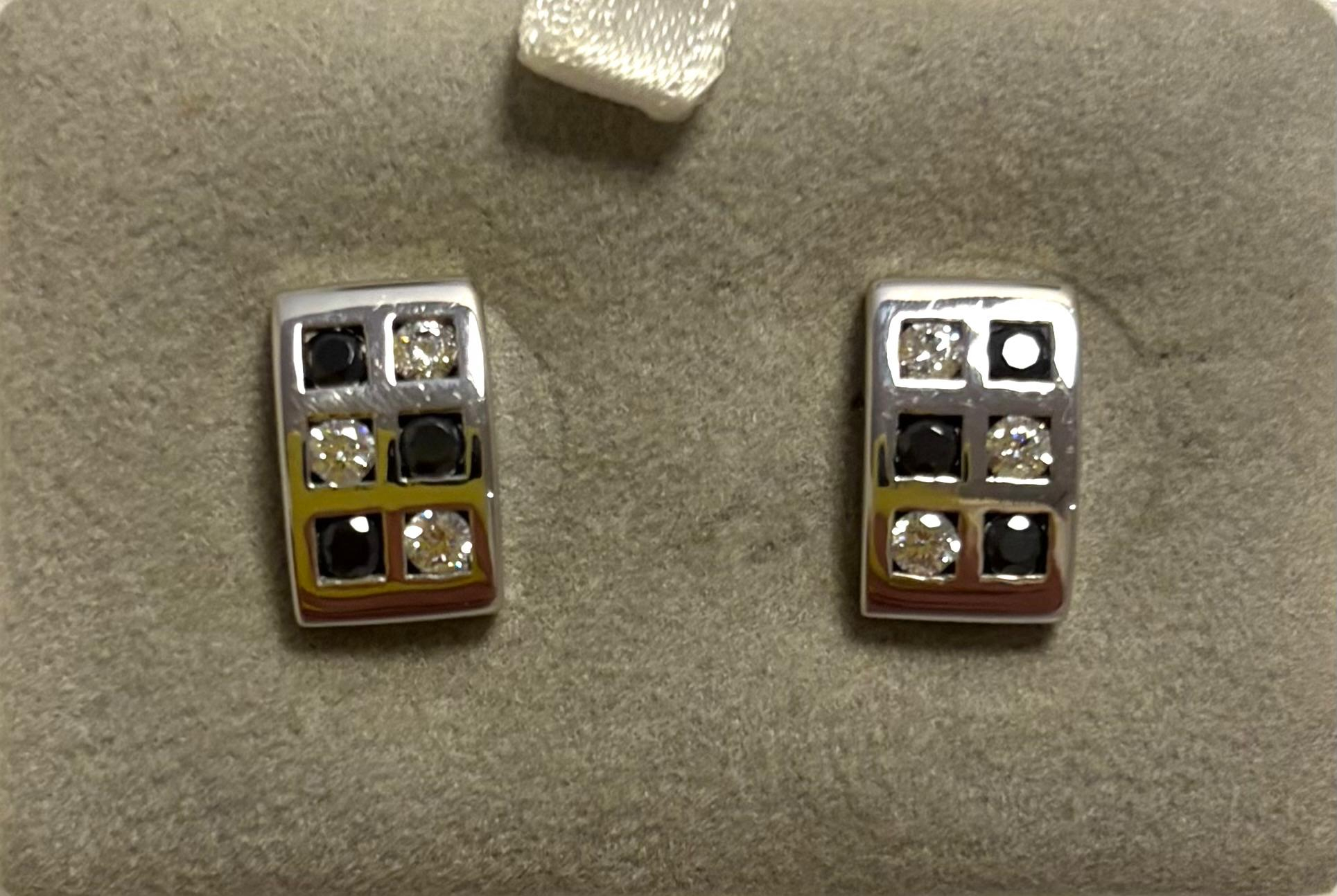 Zilveren oorknoppen zwart/wit zirkonia 