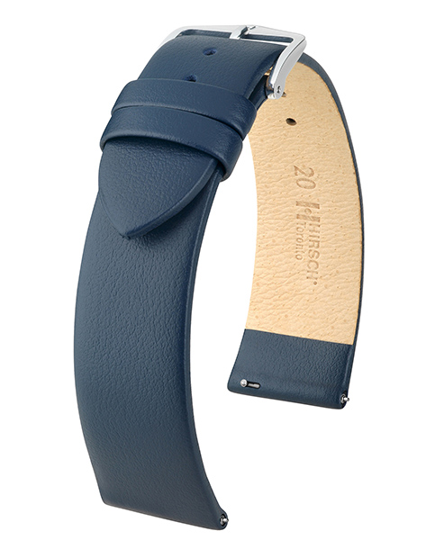 "Hard shell, soft core" - according to this motto, our watch bracelet TORONTO captivates with understated elegance. On your wrist, this bracelet looks both, robust and silky soft. Here we combine Italian calfskin with exceptionally fine grain pattern and our HIRSCH Softglove lining leather. In addition, the flat design and the beautifully shaped buckle in HIRSCH Tradition design harmoniously finishes off this elegant leather bracelet.