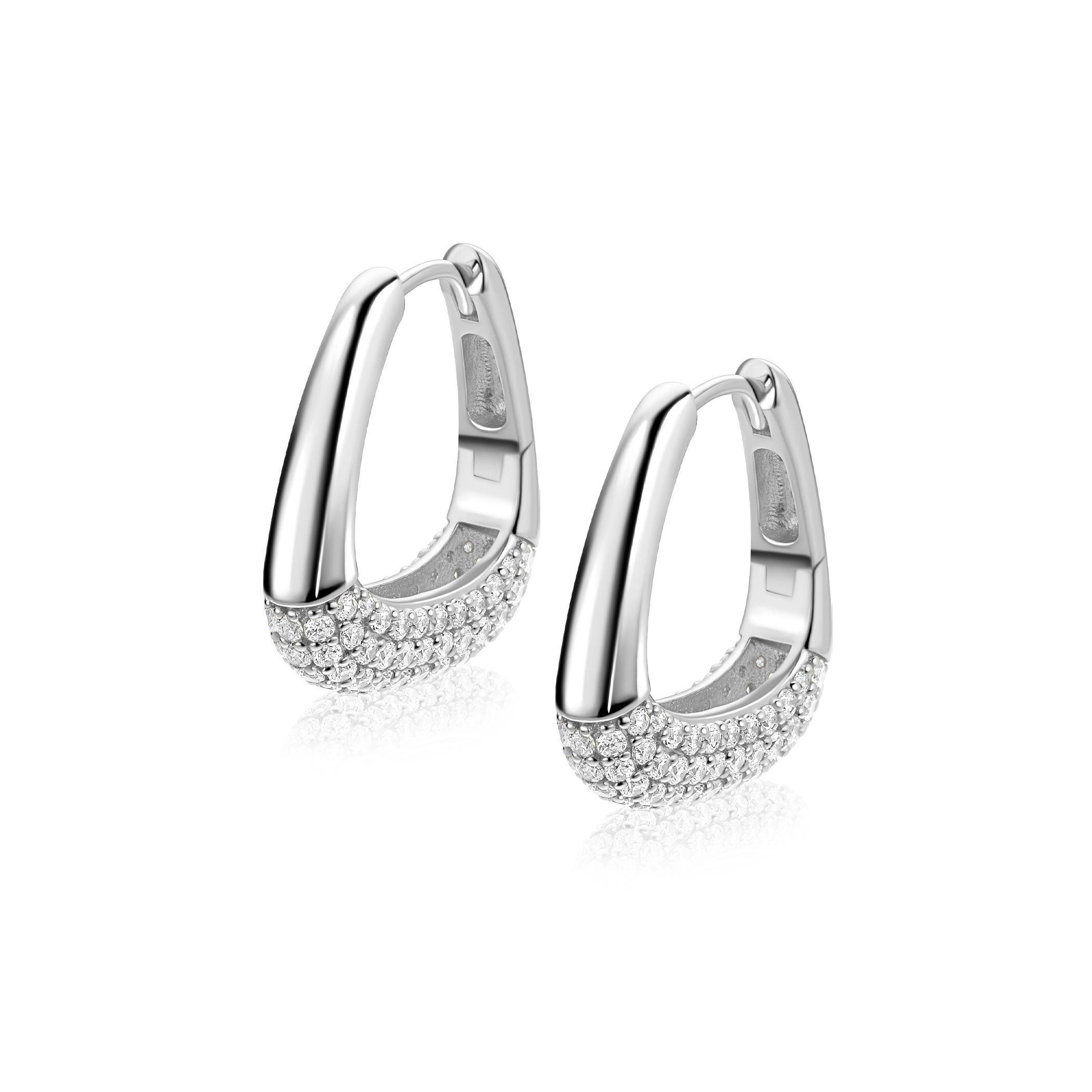 ZINZI zilveren oorringen (21mm) in een trendy tasvorm, sierlijk bezet met witte zirkonia's. Met luxe en gemakkelijke klapsluiting. De oorringen zijn vervaardigd van eerste gehalte zilver (925) en voorzien van een rodiumlaag voor een extra langdurige glans.