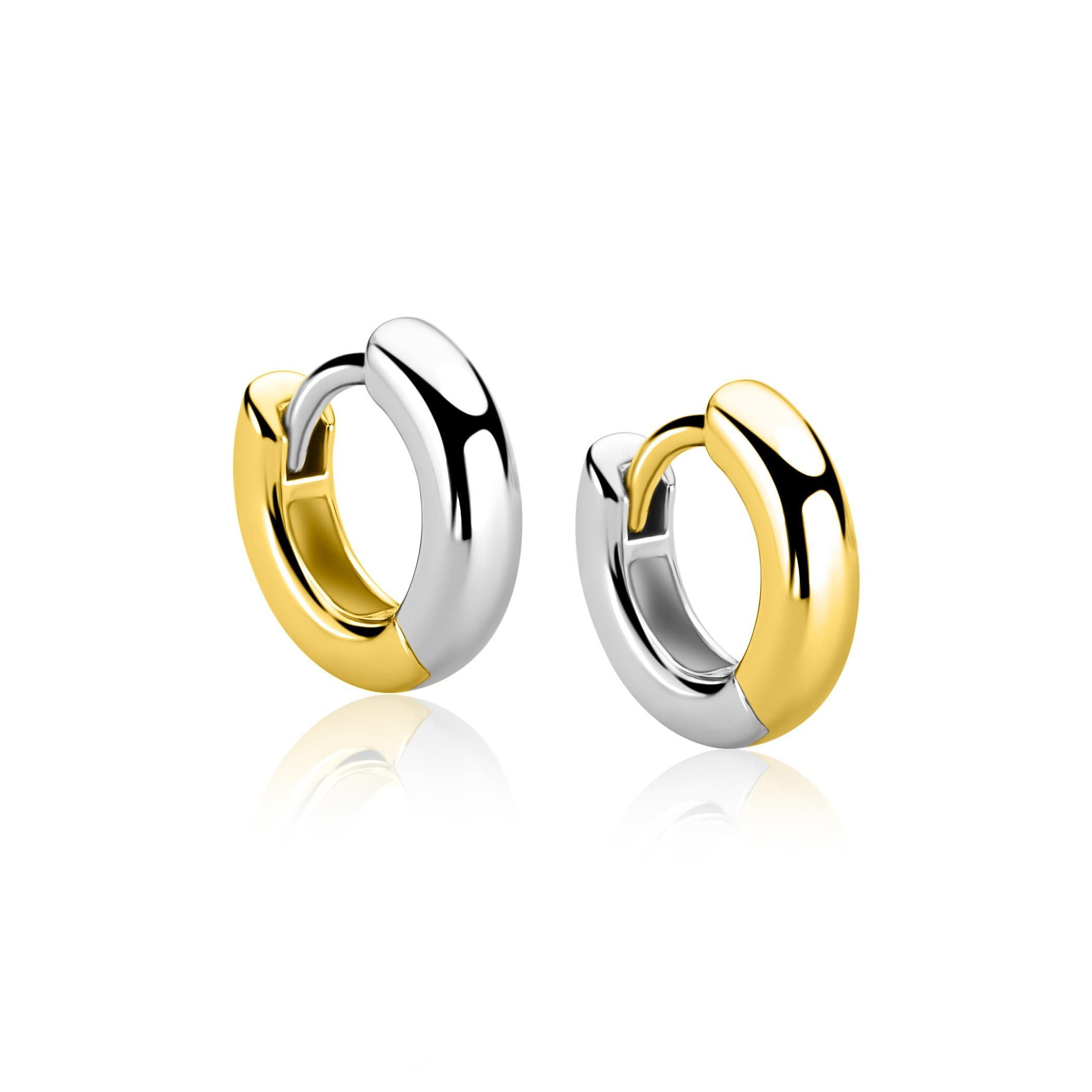 ZINZI bicolor zilveren gladde oorringen (12mm) met 3mm buisdikte, aan twee zijden te dragen. Met luxe en gemakkelijke klapsluiting. De oorringen zijn vervaardigd van eerste gehalte zilver (925) en voorzien van een rodiumlaag en extra geel verguld.