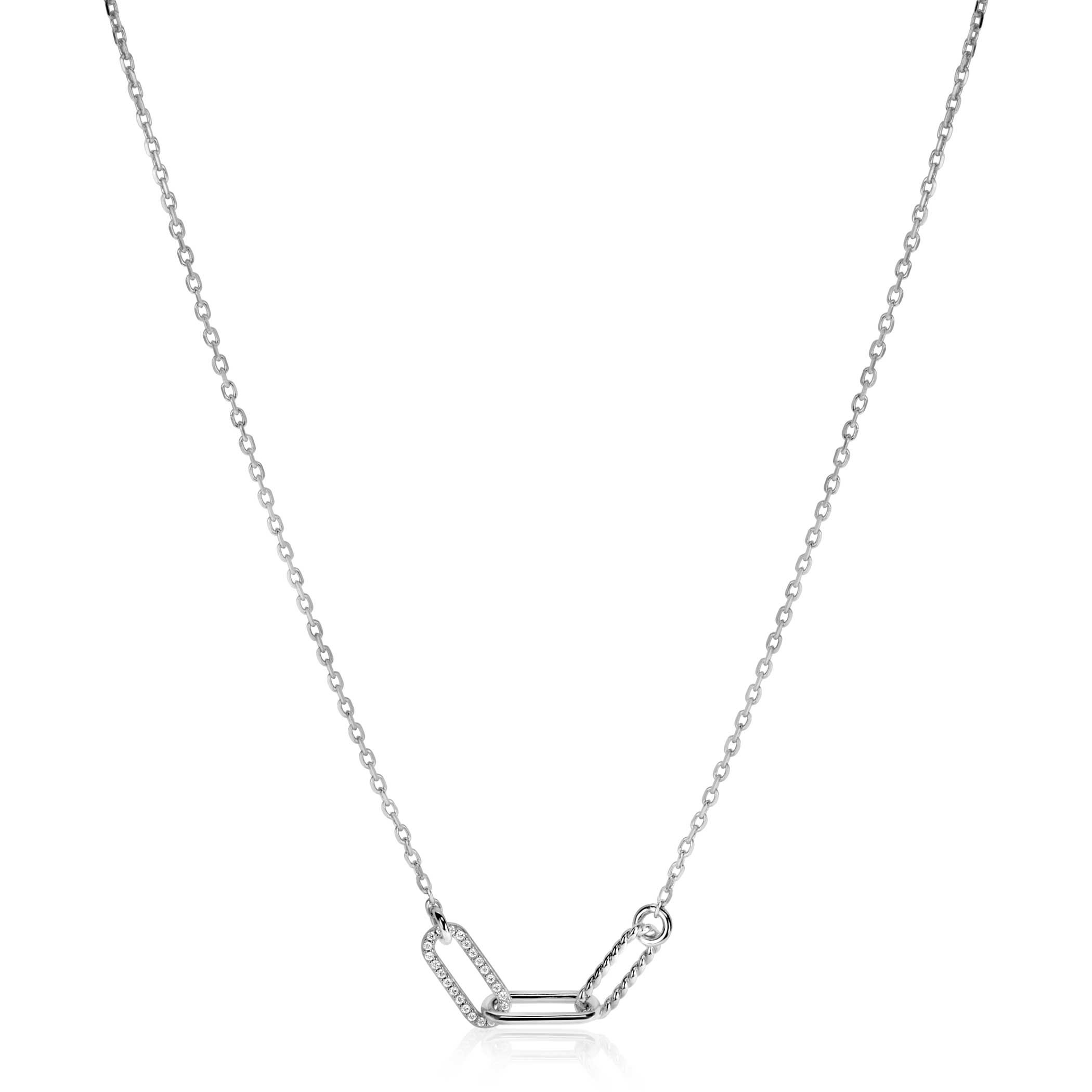 ZINZI zilveren ketting 45cm met drie trendy paperclip-schakels: met gladde buis, gedraaide buis of bezet met witte zirconia's. De lengte van de ketting is te vari&euml;ren tussen 42 en 45cm door het handige verlengkettinkje. Bij sluiting herkenbaar ZINZI, door het zilveren Zinzi hartje. Vervaardigd van eerste gehalte zilver (925) en voorzien van een extra rodiumlaag voor een langdurige glans.