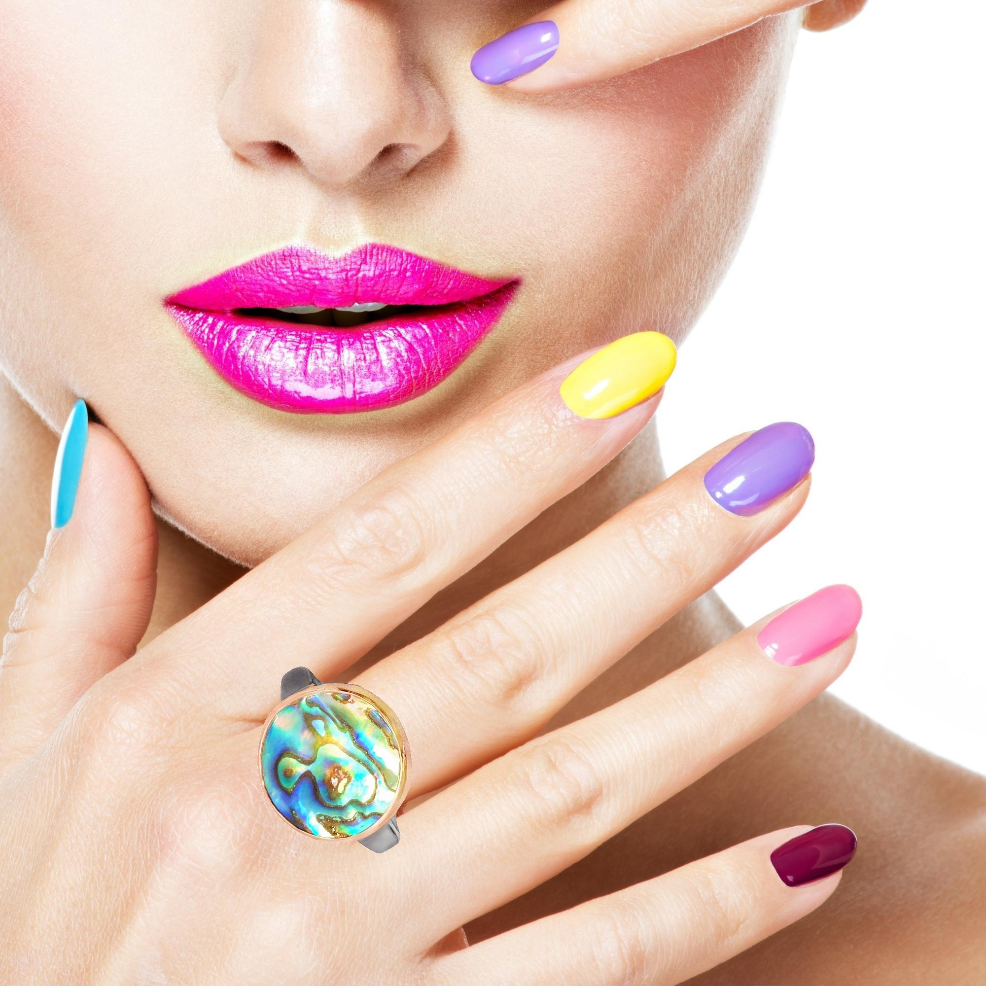 Ring in Knitteroptik, Silber 925, Gold 750, Abalone Muschelscheibe, Größe 58

Gefertigt im Atelier Kissner
Design: Carsten Kissner


UNIKAT