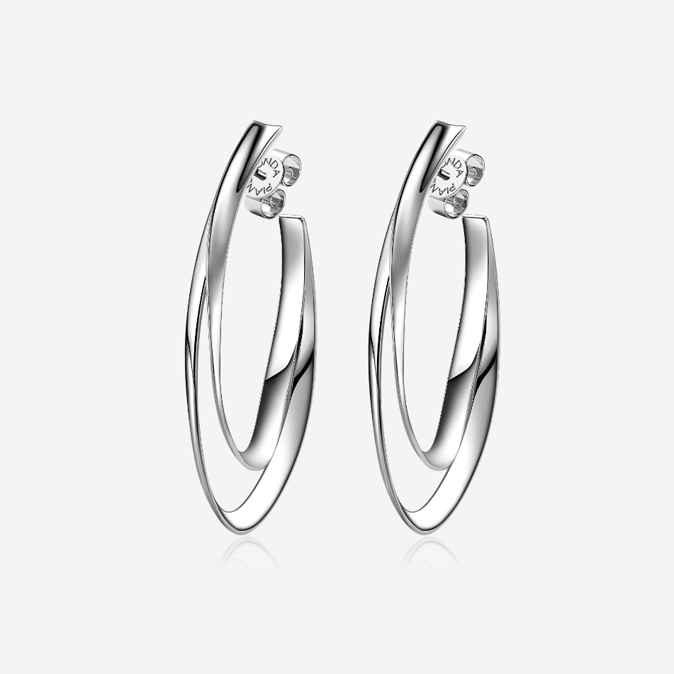 Details
Metals: 925‰ Sterling silver
Collection: SCRIPTA
The Scripta collection by Pianegonda consists of silver jewelery with a sinuous design, like a ribbon that winds around itself and adapts to the shape of the body wearing it. Here you will find bracelets, necklaces, rings and earrings designed to last over time and preserve the beauty of silver that has always distinguished Pianegonda jewels. Explore the Scripta collection now.