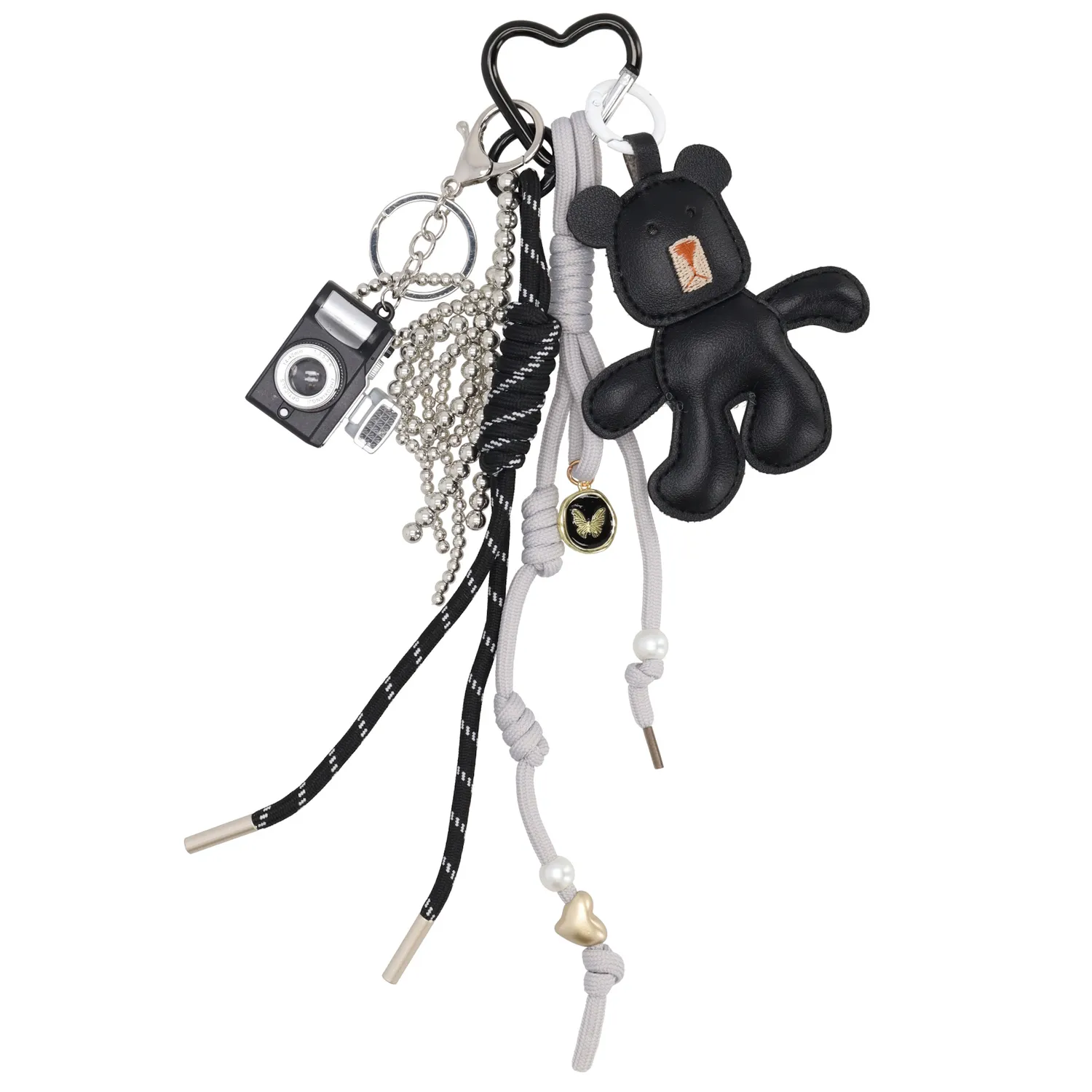 De Trendy Bag Charm - 001 Zwart, modelnummer P038, van een onbekend merk, is een stijlvol accessoire uit de categorie ACCESSOIRES en valt onder SLEUTELHANGERS. Ideaal voor het personaliseren van je tas of sleutels. Bevestig het eenvoudig aan je handtas of rugzak voor een trendy look. Een perfecte mix van functionaliteit en mode.