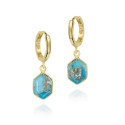 GEO collectie Jorge Revilla.

Zilver vergulden oorhangers met turquoise.
27 mm lengte.