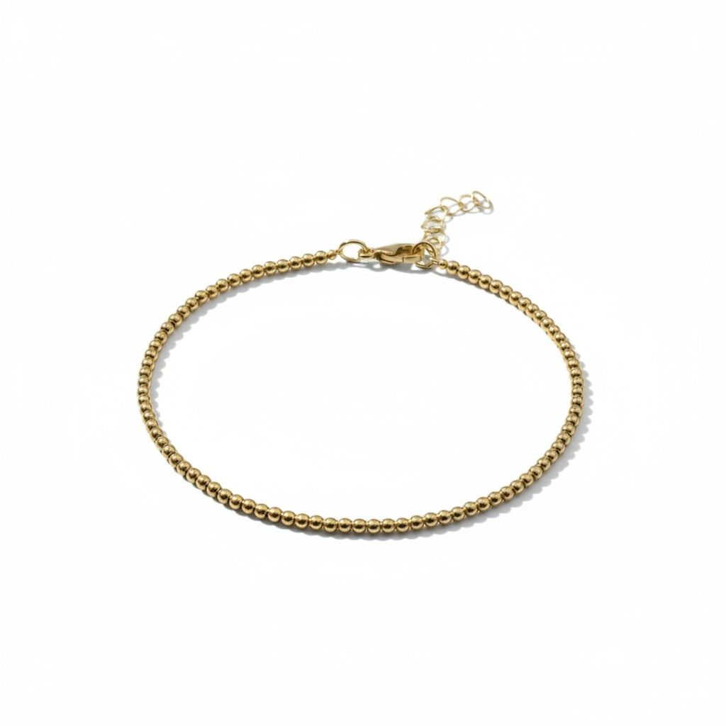 Dit "Armband Bolletjes" ideaal als statement juweel of voor dagelijks gebruik. Met een breedte van 2,1 mm past het elegant om de pols. Het beste te dragen als finishing touch bij elke outfit voor een vleugje luxe en stijl.