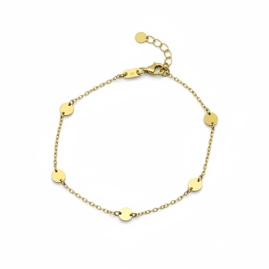 Dit prachtige armbandje met ronde plaatjes, is gemaakt van 14 karaat goud en straalt een tijdloze elegantie uit. Perfect voor elke gelegenheid, voegt het een verfijnde touch toe aan elke outfit. Combineer met andere gouden sieraden voor een stijlvolle look. Ideaal als geschenk of als aanvulling op je eigen sieradencollectie.